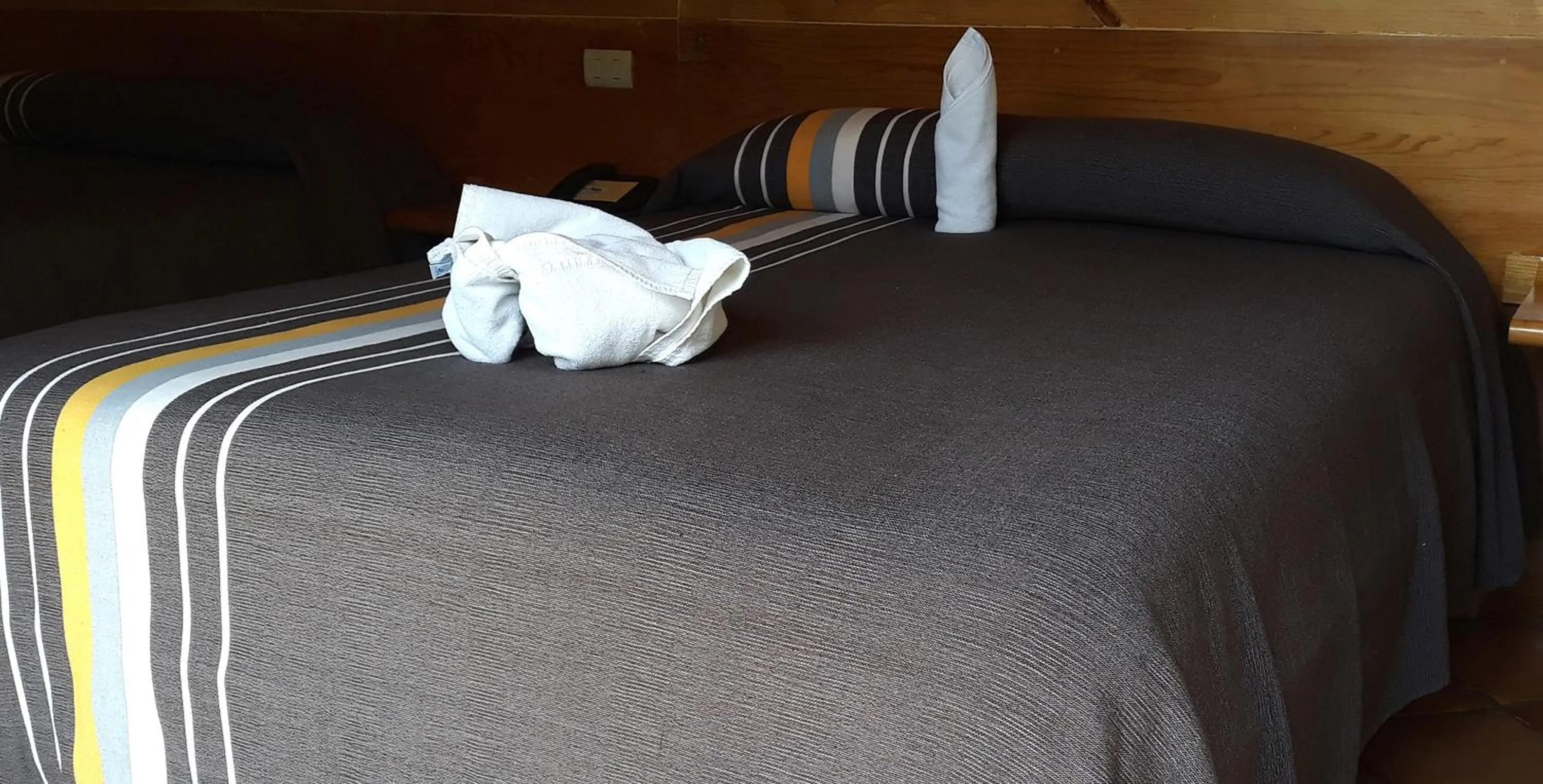 Bed in Axkan Arte Hotel