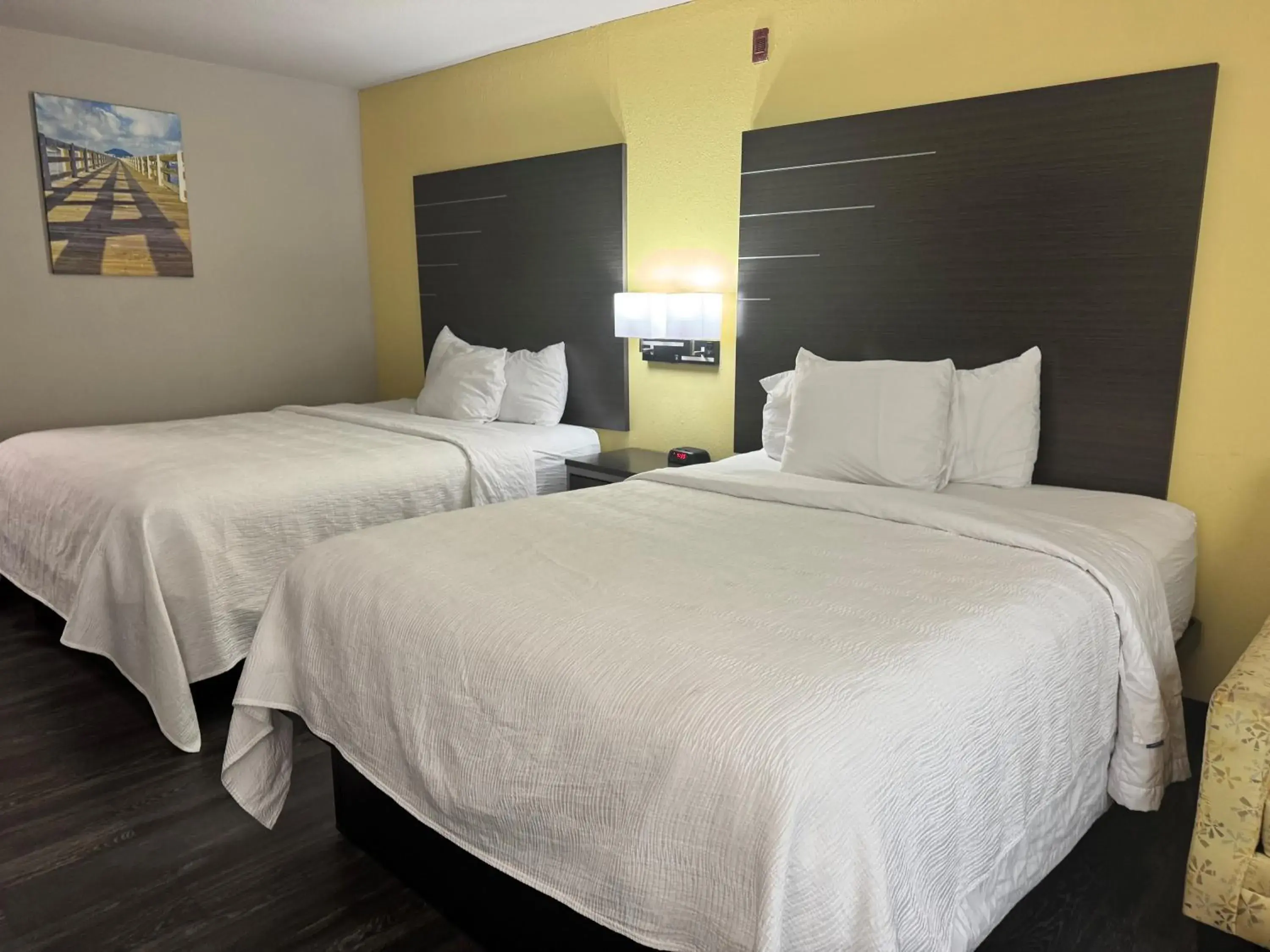 Bedroom, Bed in Wingate by Wyndham Biloxi - Ocean Springs Bedroom, Bed in Wingate by Wyndham Biloxi - Ocean Springs