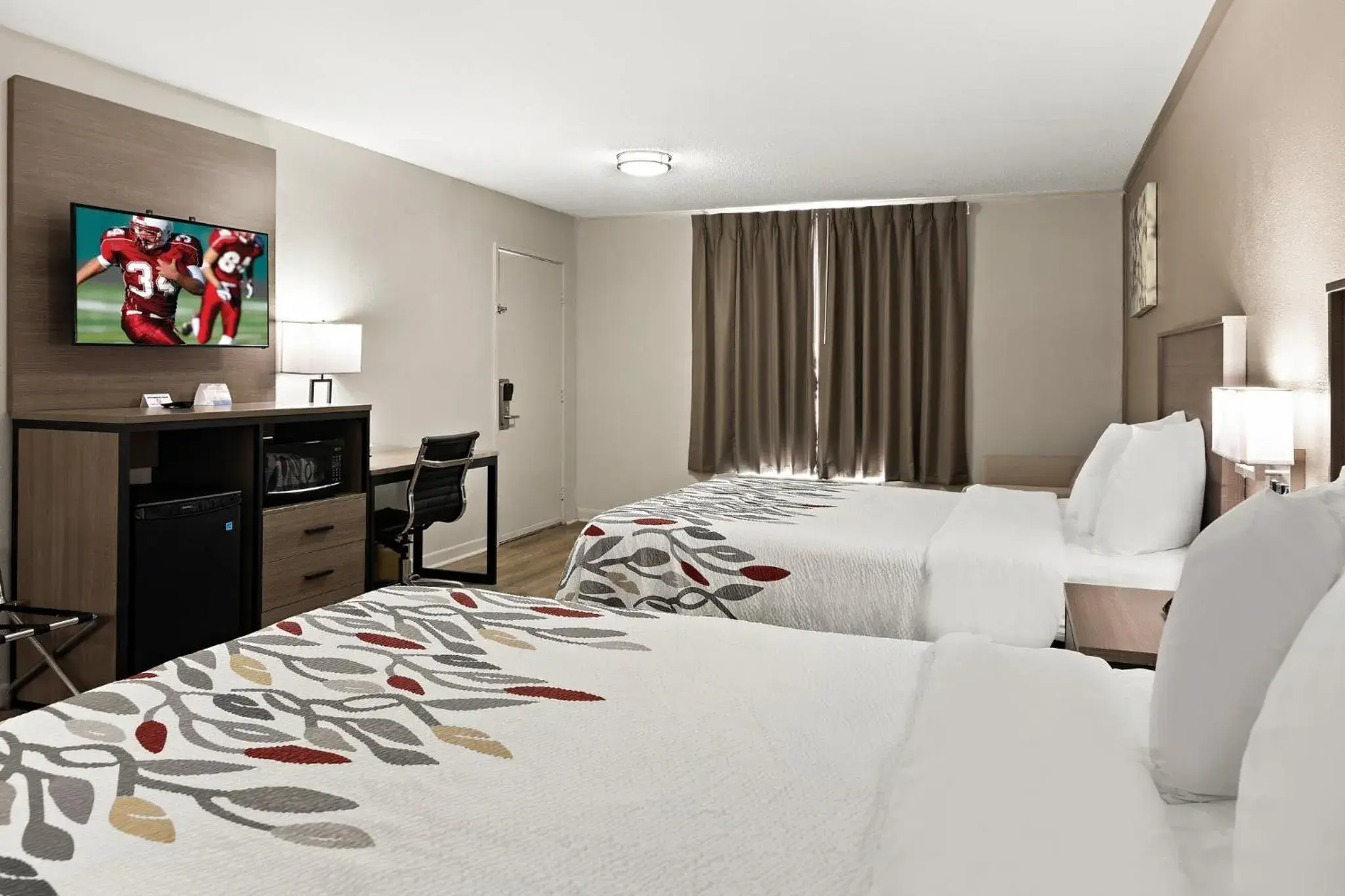 Deluxe Room with Two Queen Beds Non-Smoking in Red Roof Inn & Suites Monroe, NC Deluxe Room with Two Queen Beds Non-Smoking in Red Roof Inn & Suites Monroe, NC