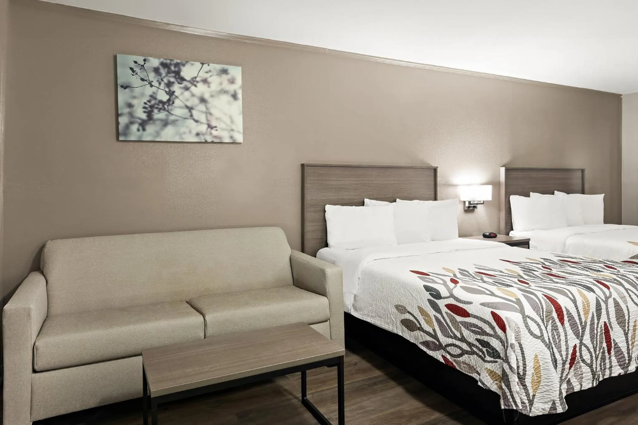 Photo of the whole room, Bed in Red Roof Inn & Suites Monroe, NC