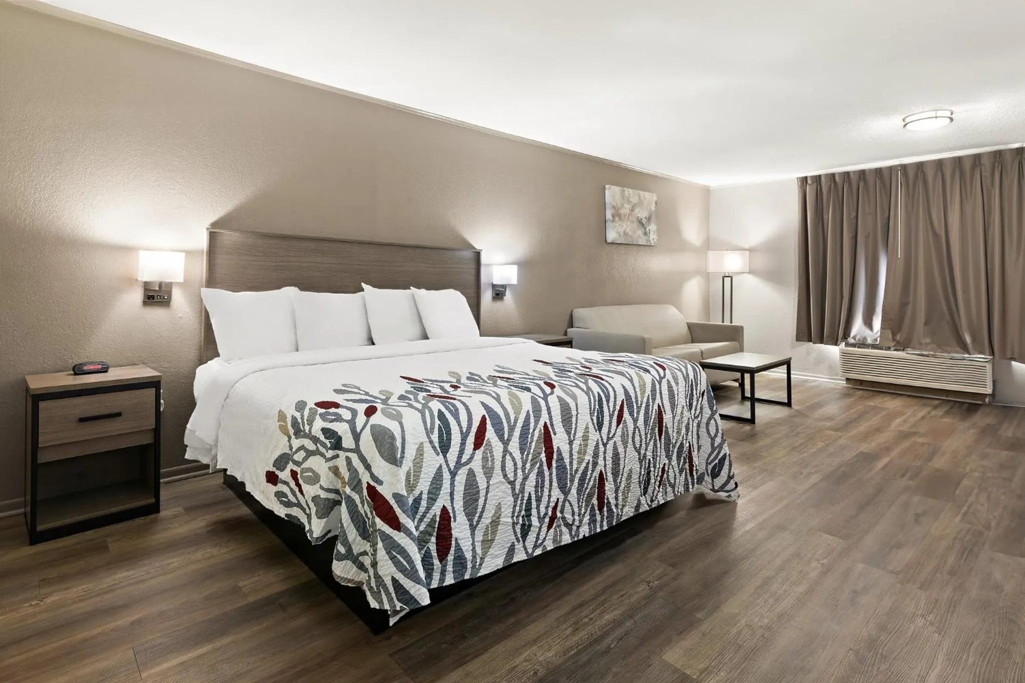 Photo of the whole room, Bed in Red Roof Inn & Suites Monroe, NC