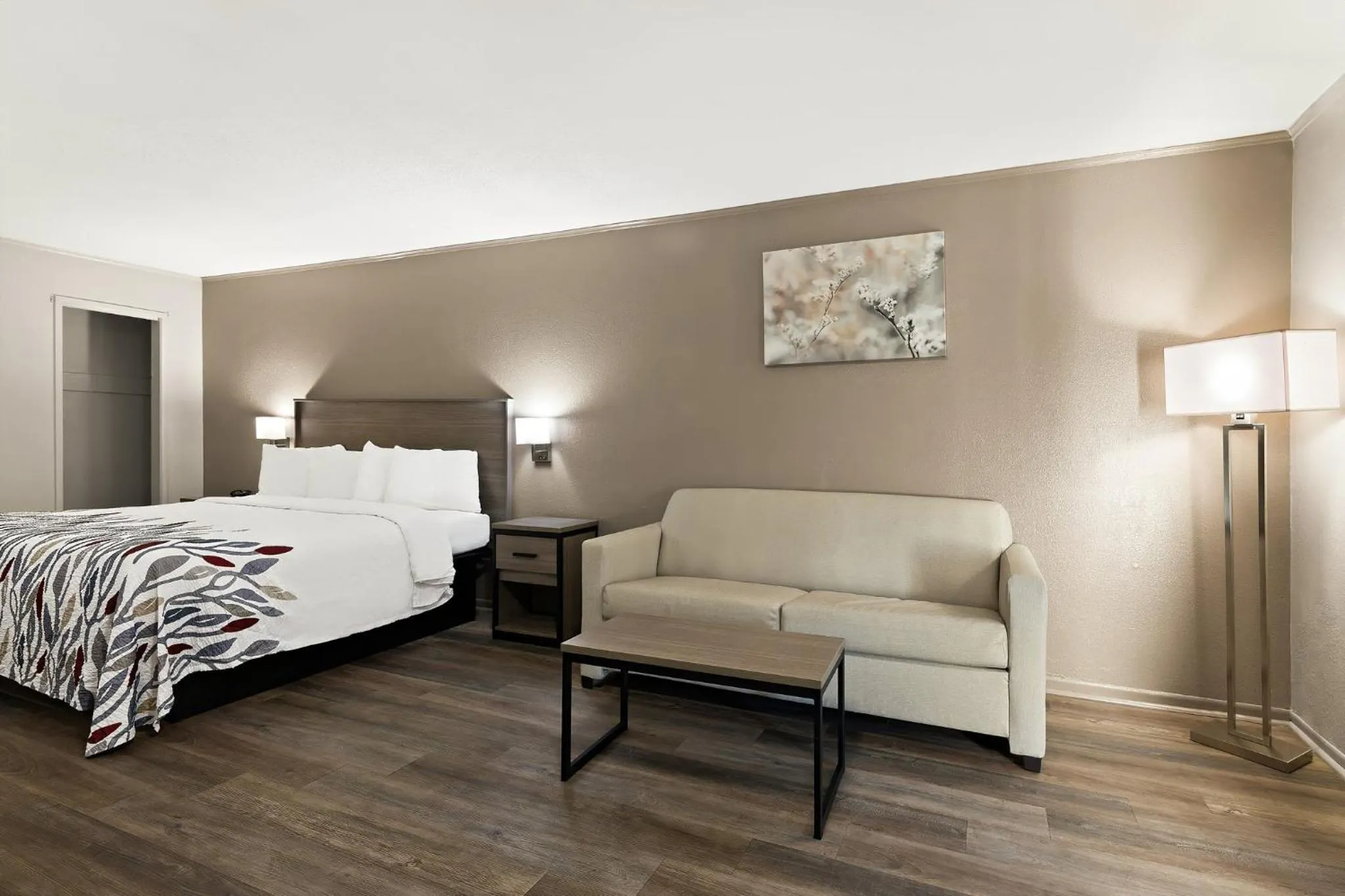 Photo of the whole room, Bed in Red Roof Inn & Suites Monroe, NC