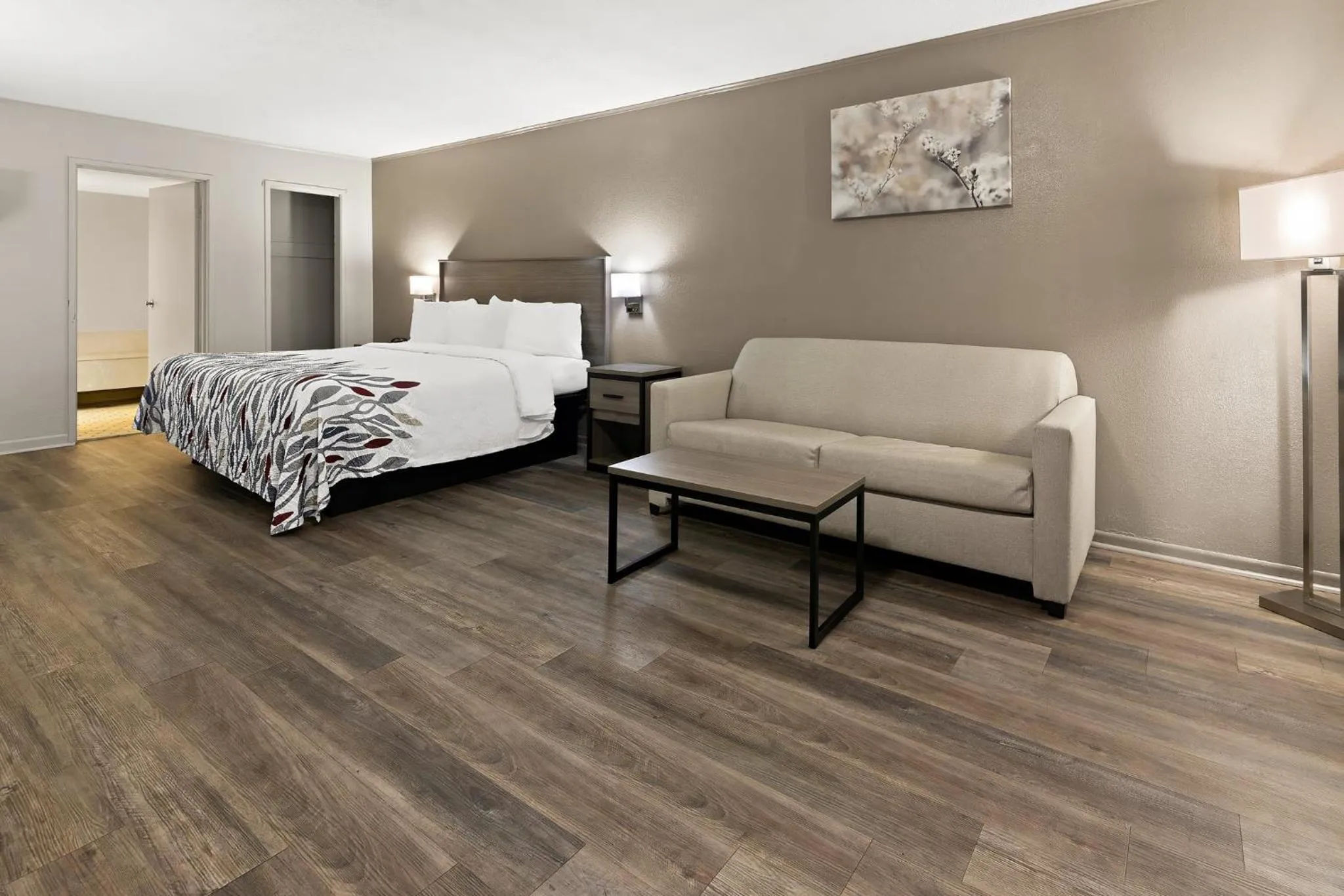 Photo of the whole room, Bed in Red Roof Inn & Suites Monroe, NC