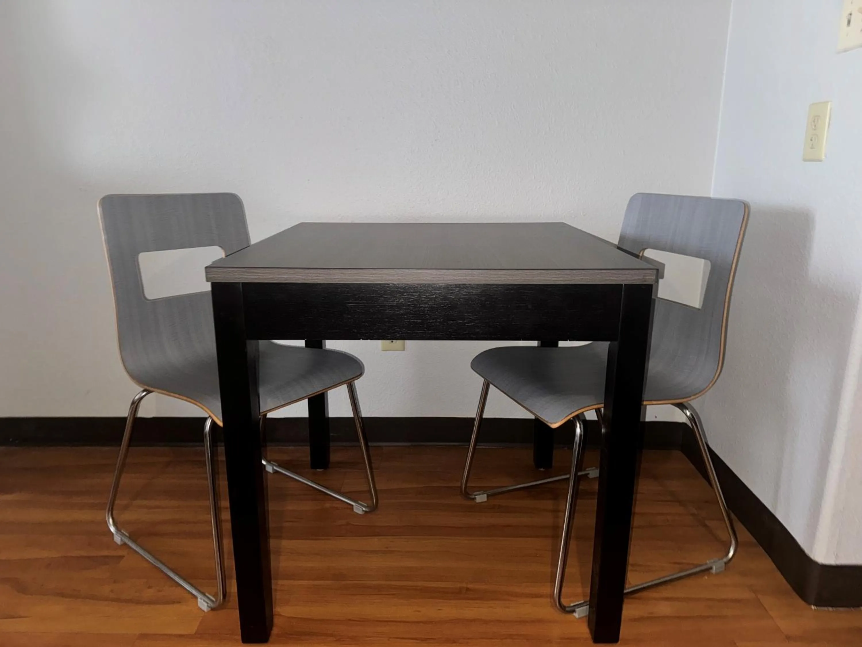 Seating area in Super 8 by Wyndham Sealy