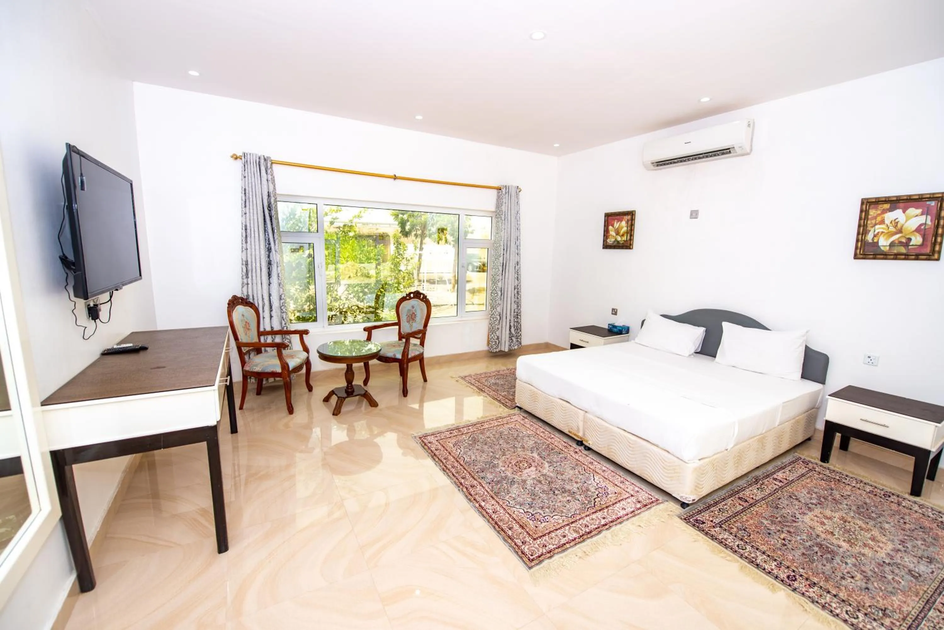 Photo of the whole room, Bed in Oriental Nights Rest House