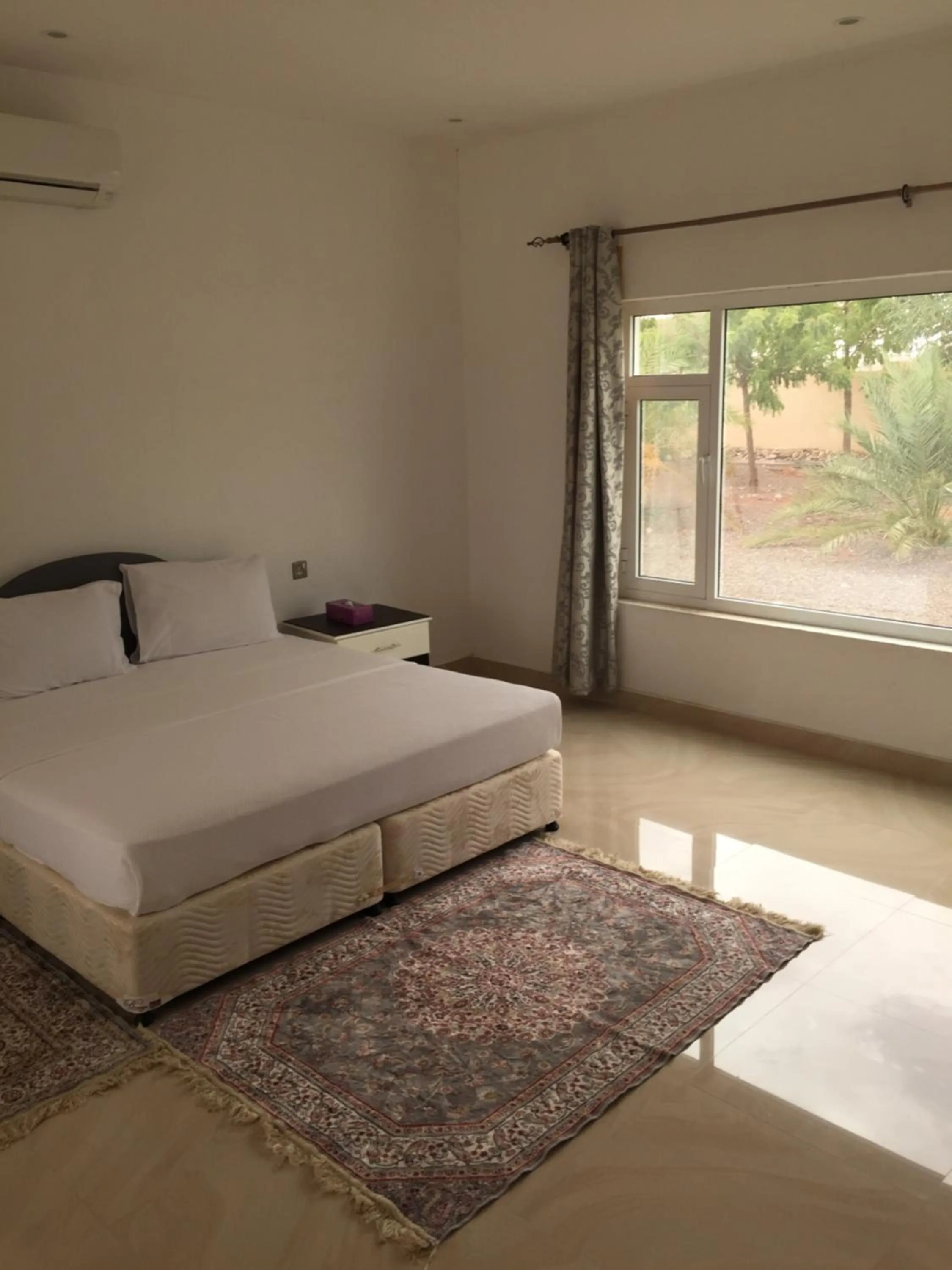 Photo of the whole room, Bed in Oriental Nights Rest House