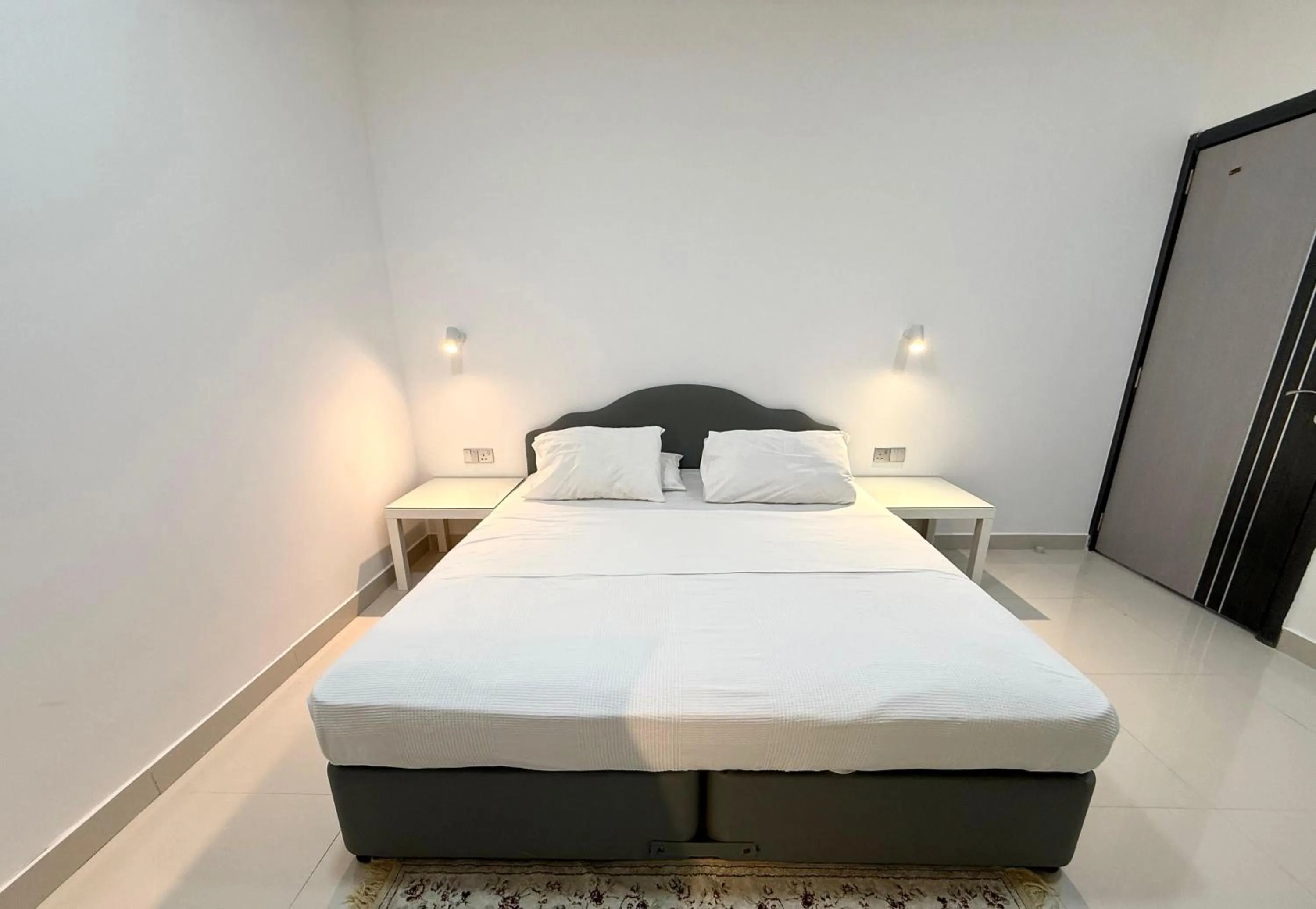 Bed in Oriental Nights Rest House