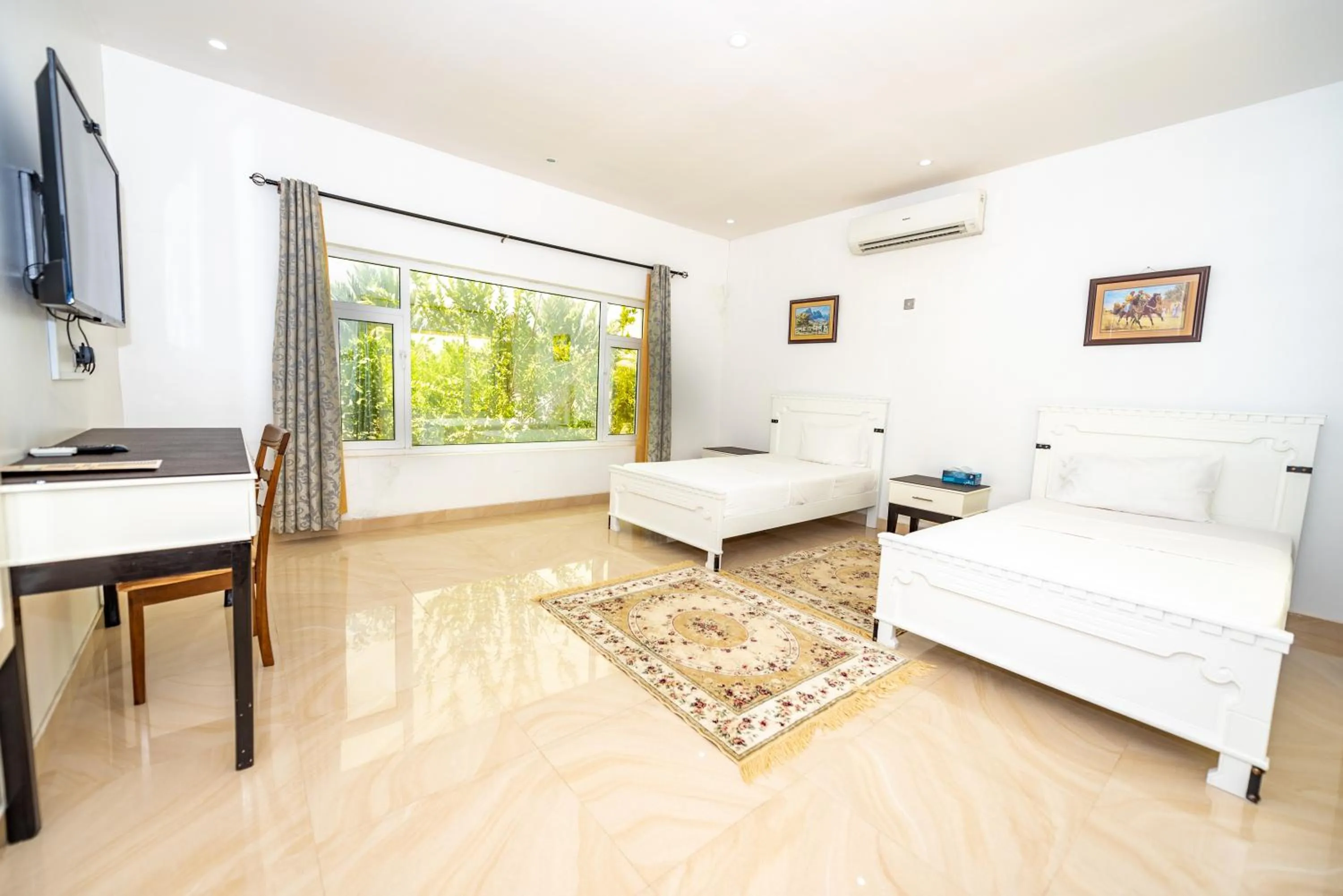 Photo of the whole room, Bed in Oriental Nights Rest House