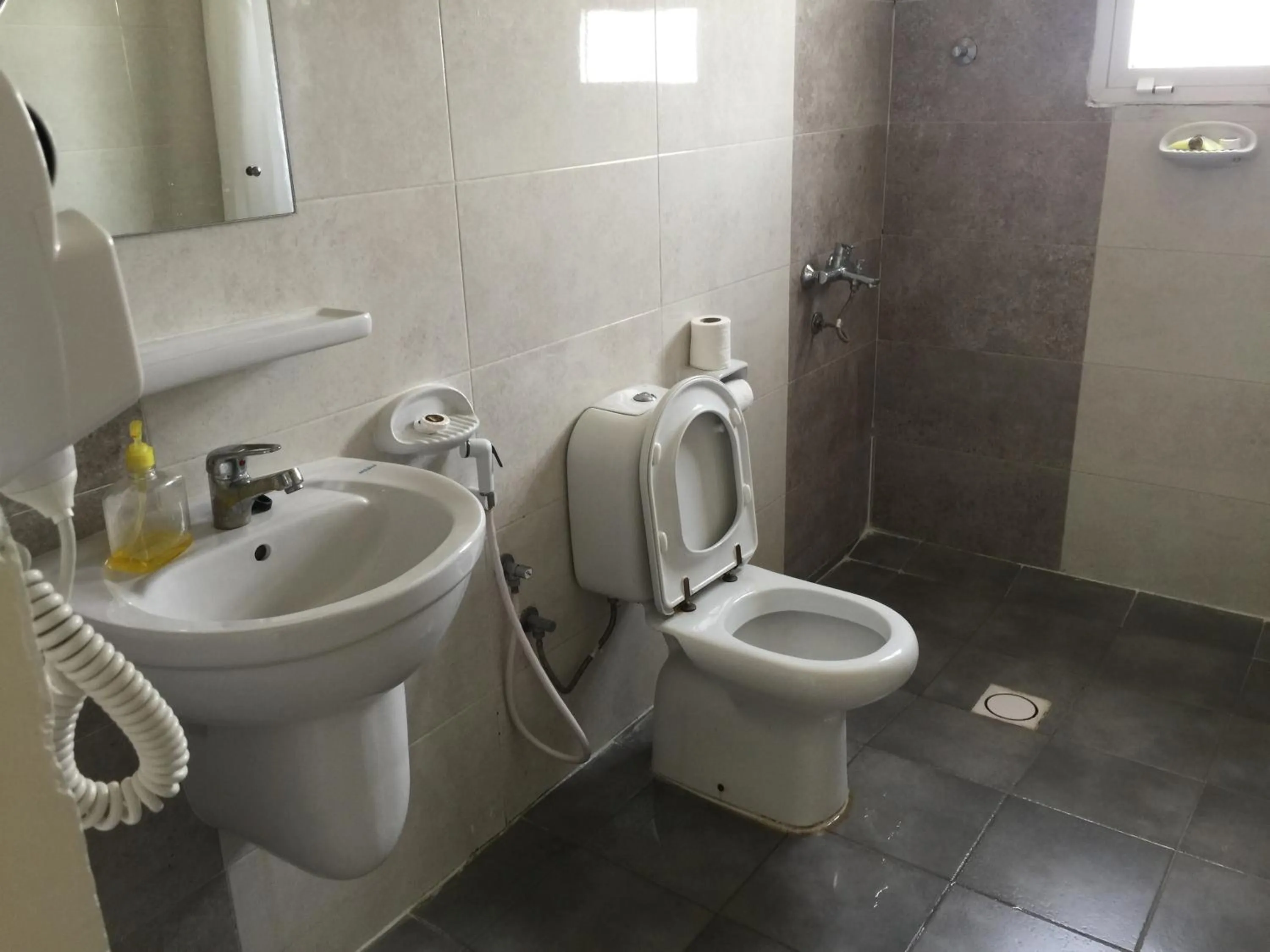 Toilet in Oriental Nights Rest House