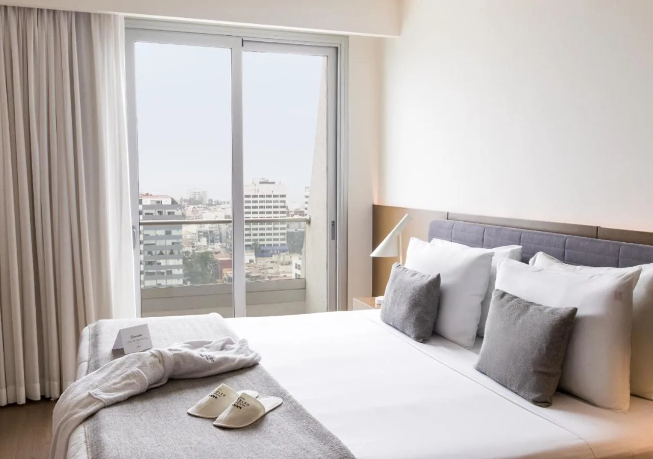 Photo of the whole room, Bed in Dazzler by Wyndham Lima San Isidro