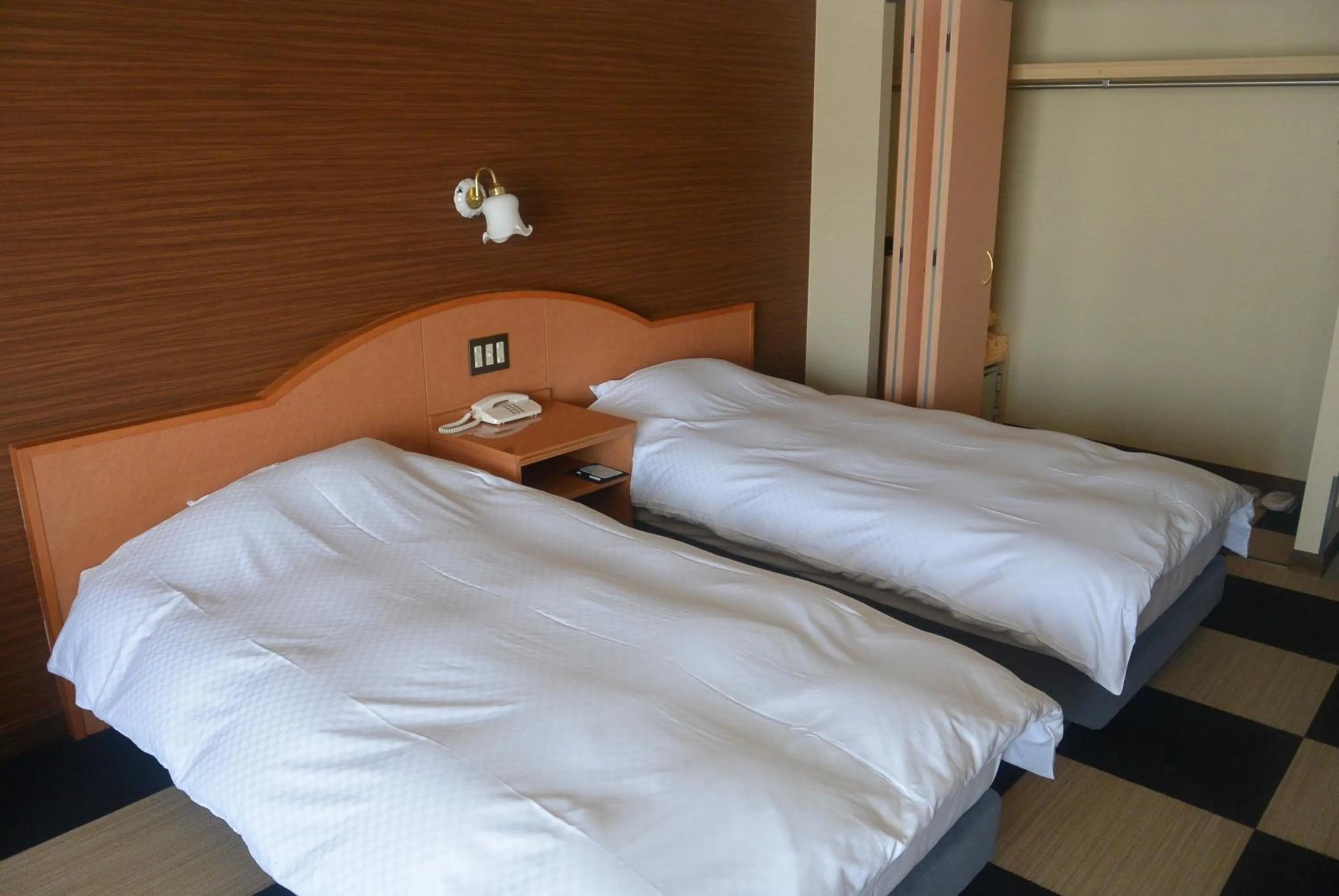 Bed in Shiretoko Noble Hotel