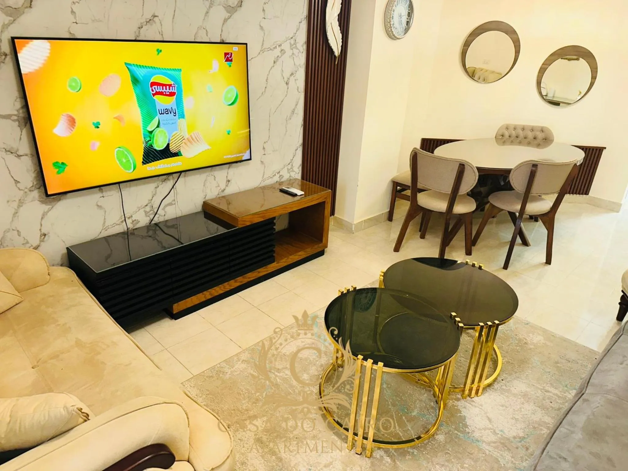 Communal lounge/ TV room in Casa Do Cairo - Rehab City