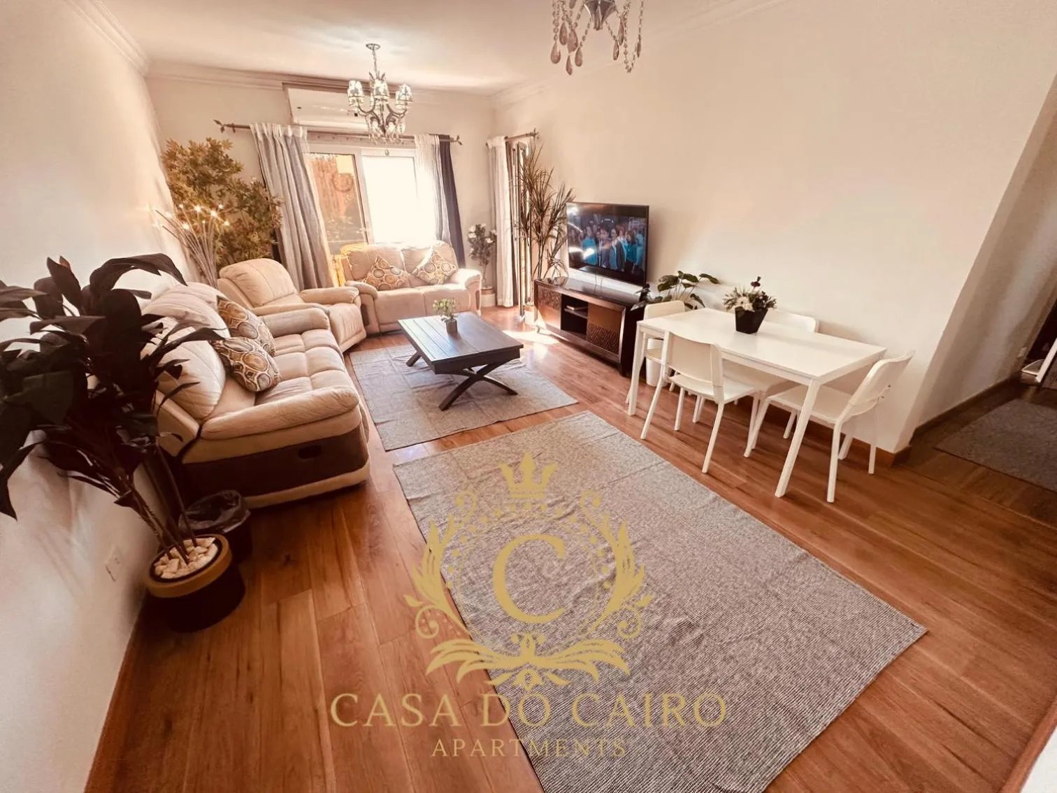 Communal lounge/ TV room in Casa Do Cairo - Rehab City
