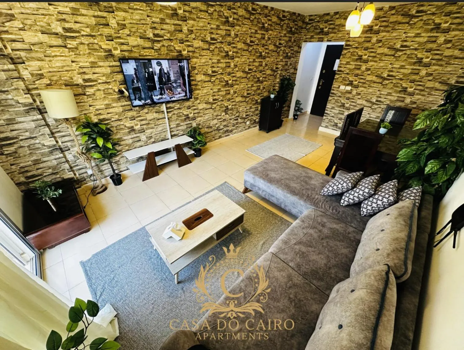 Communal lounge/ TV room in Casa Do Cairo - Rehab City