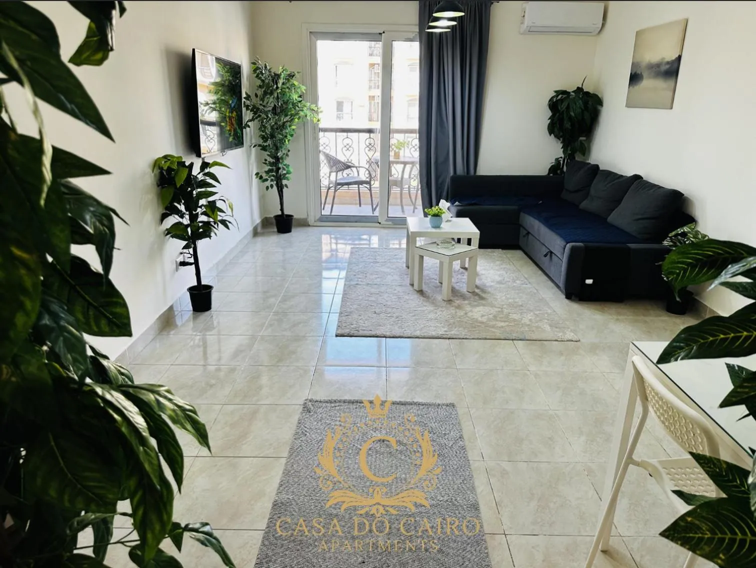 Communal lounge/ TV room in Casa Do Cairo - Rehab City