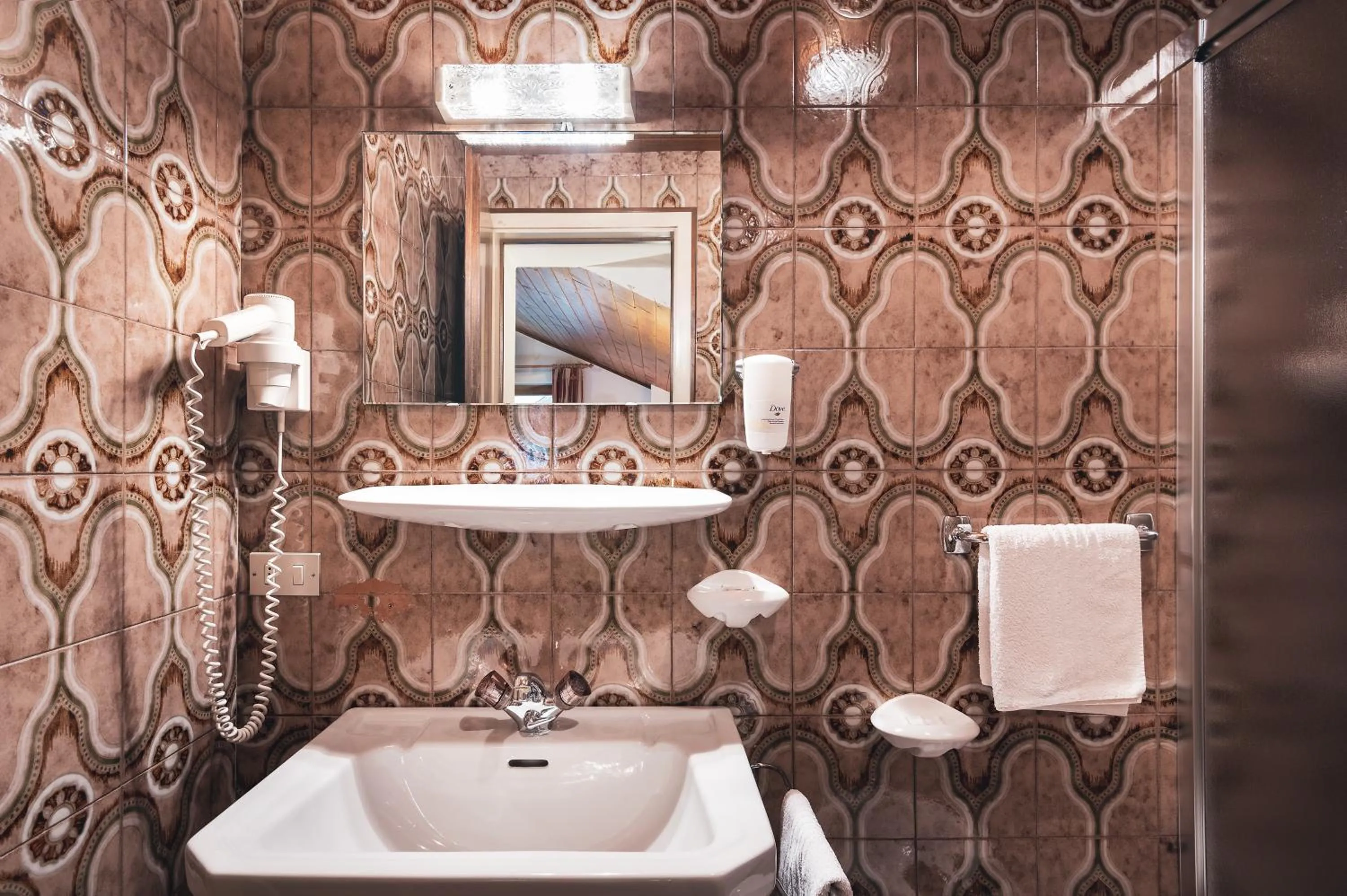 Bathroom in Garnì Iosc