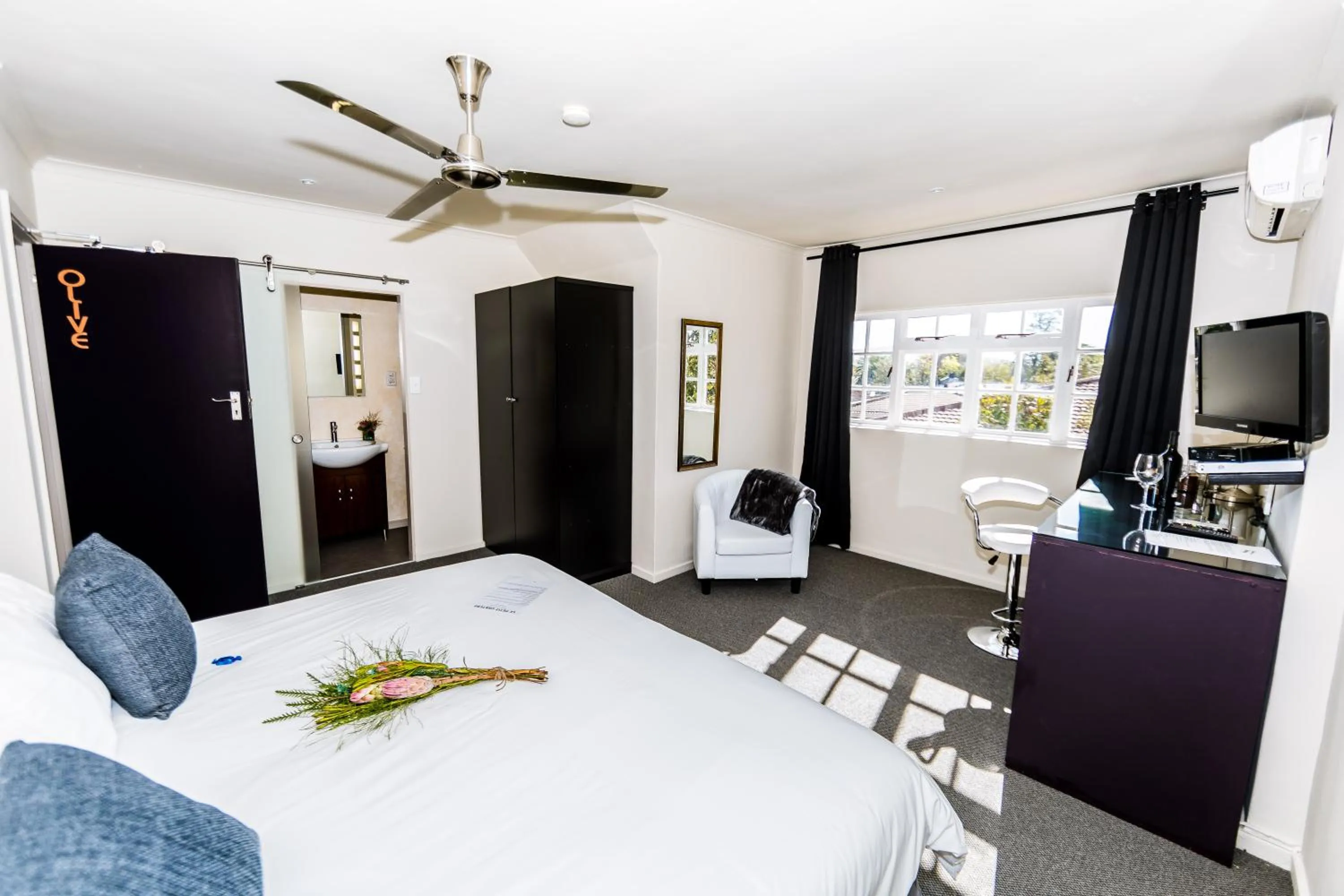 Bed in Le Petit Chateau Guest House