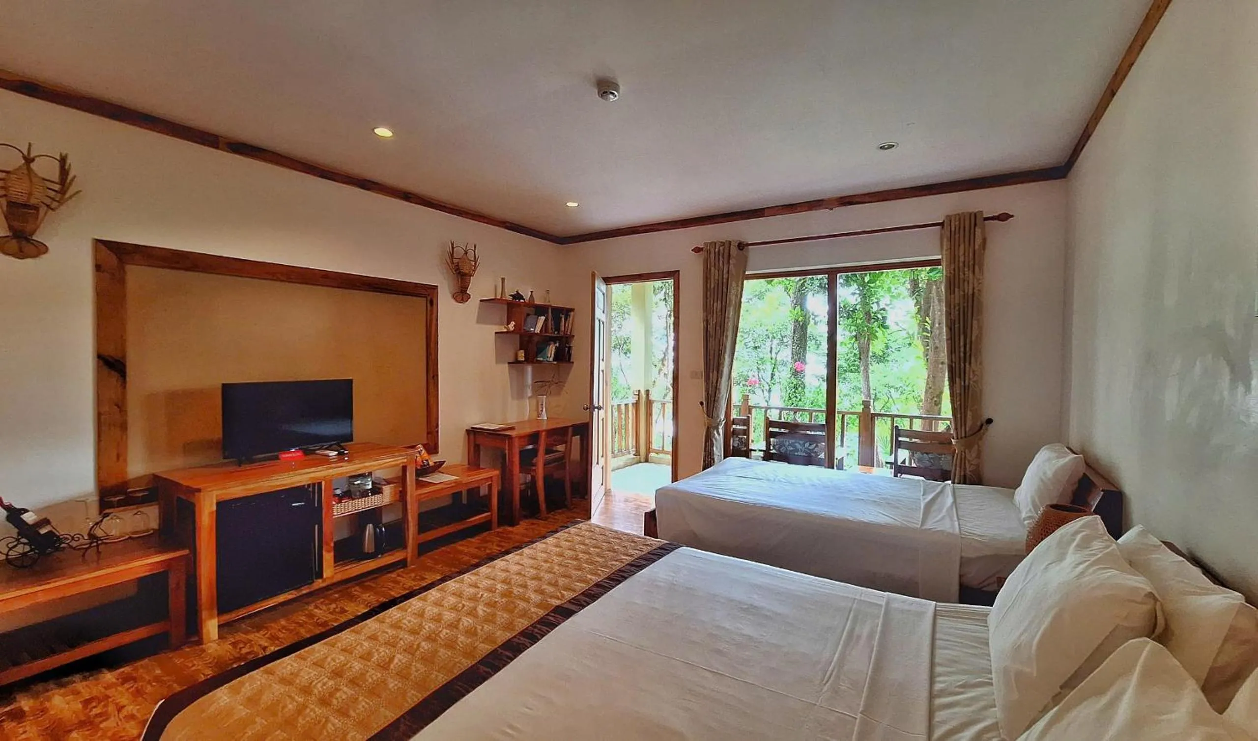 Bed in Ancarine Beach Resort