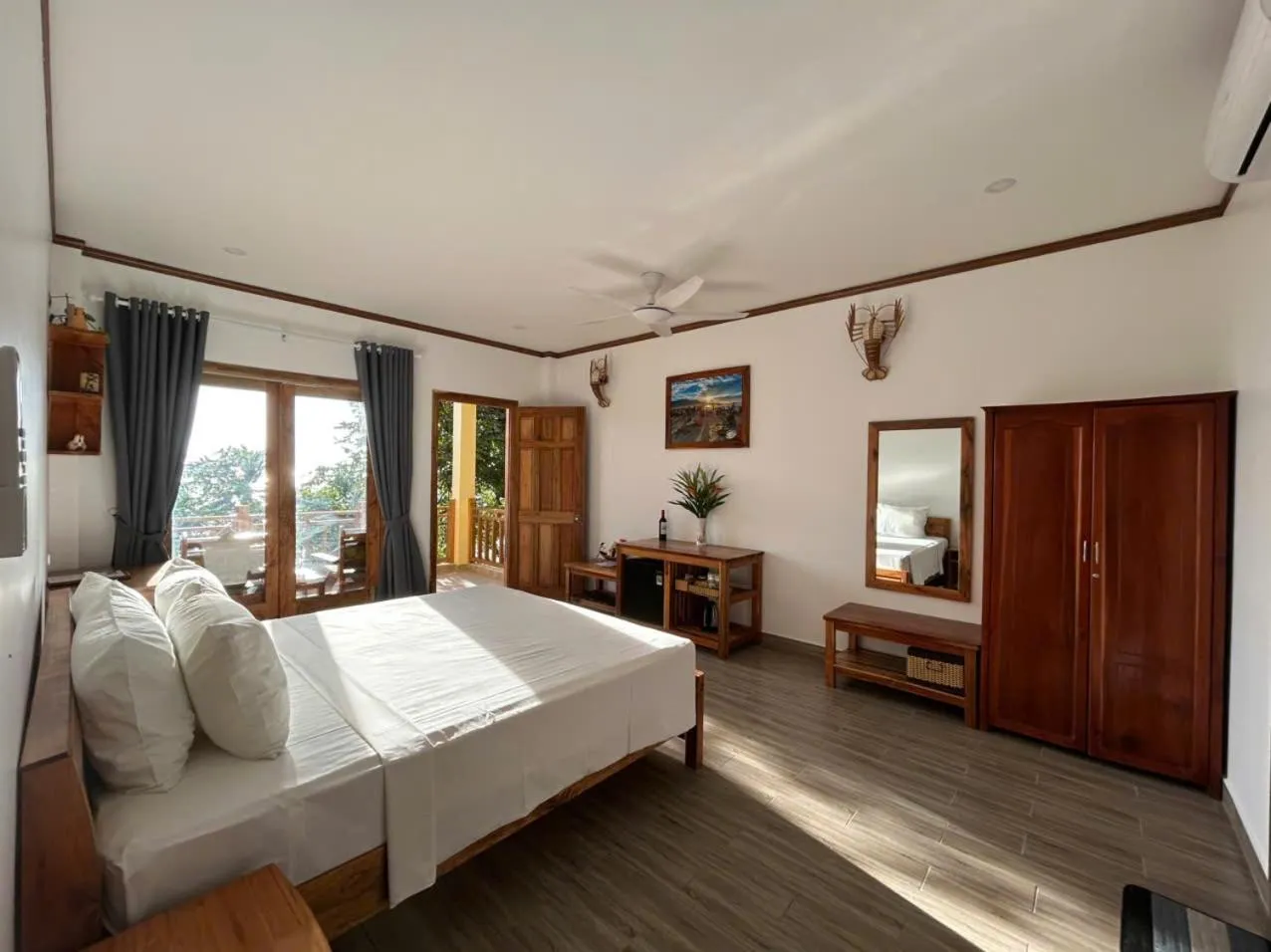 Bed in Ancarine Beach Resort