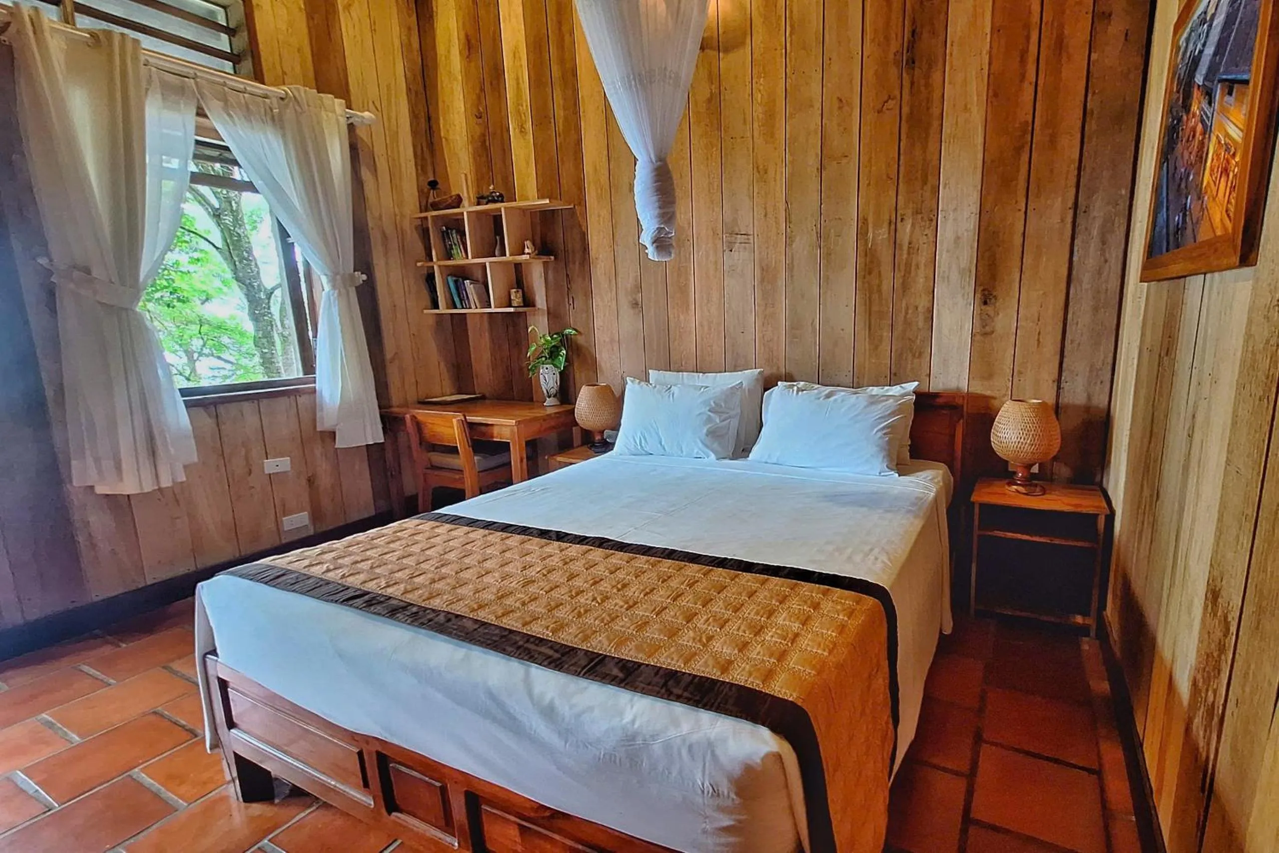 Bed in Ancarine Beach Resort