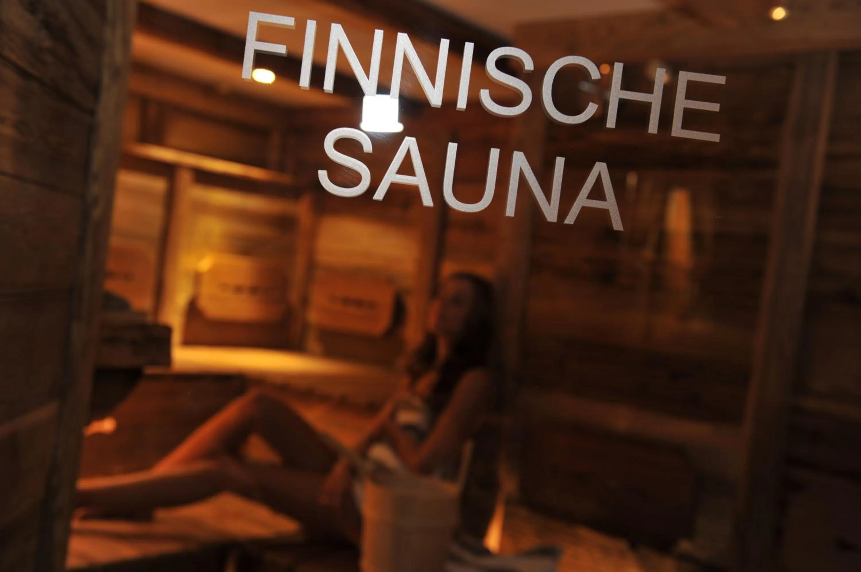 Property logo or sign in Hotel Muliac