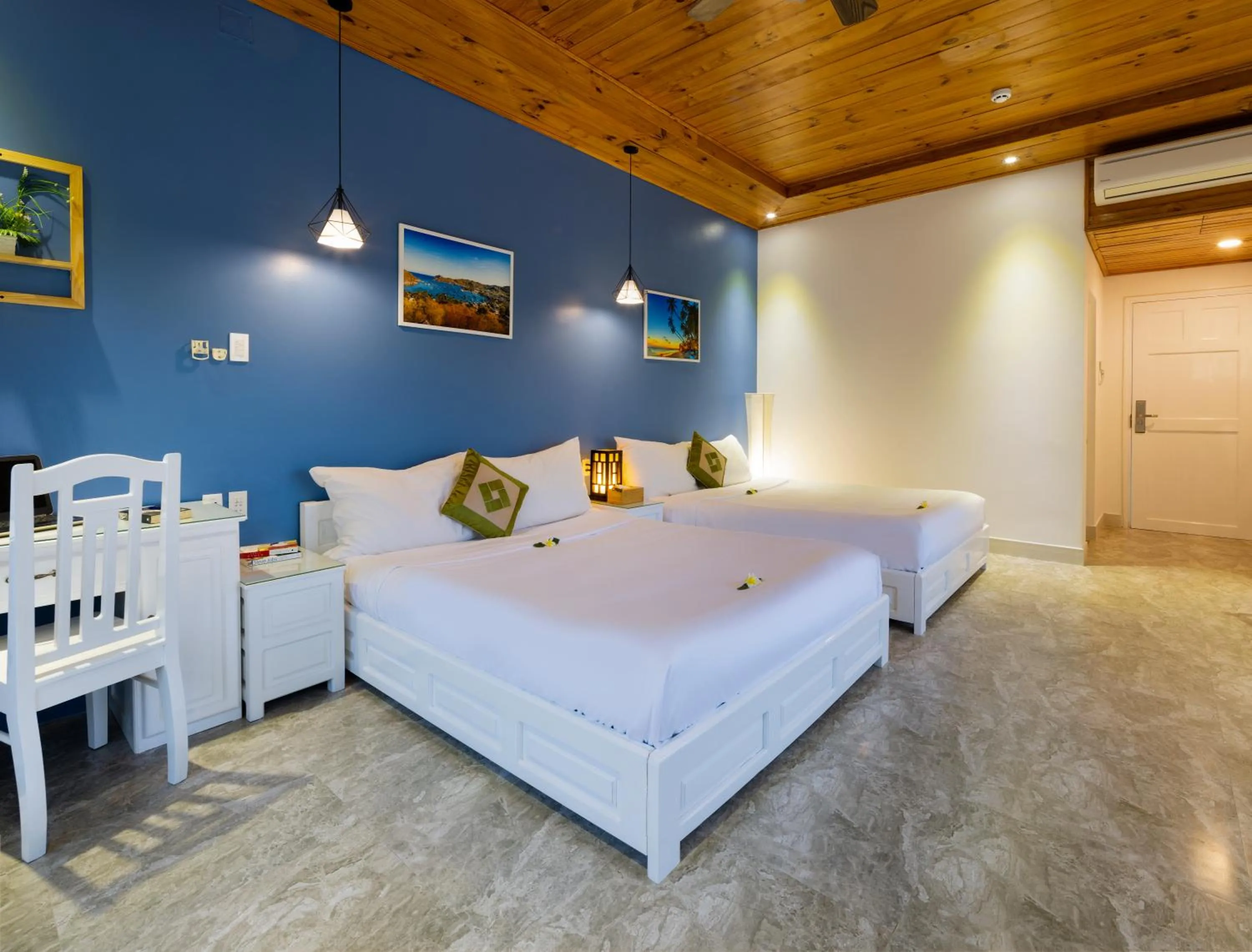 Bed in Casa Maya Resort