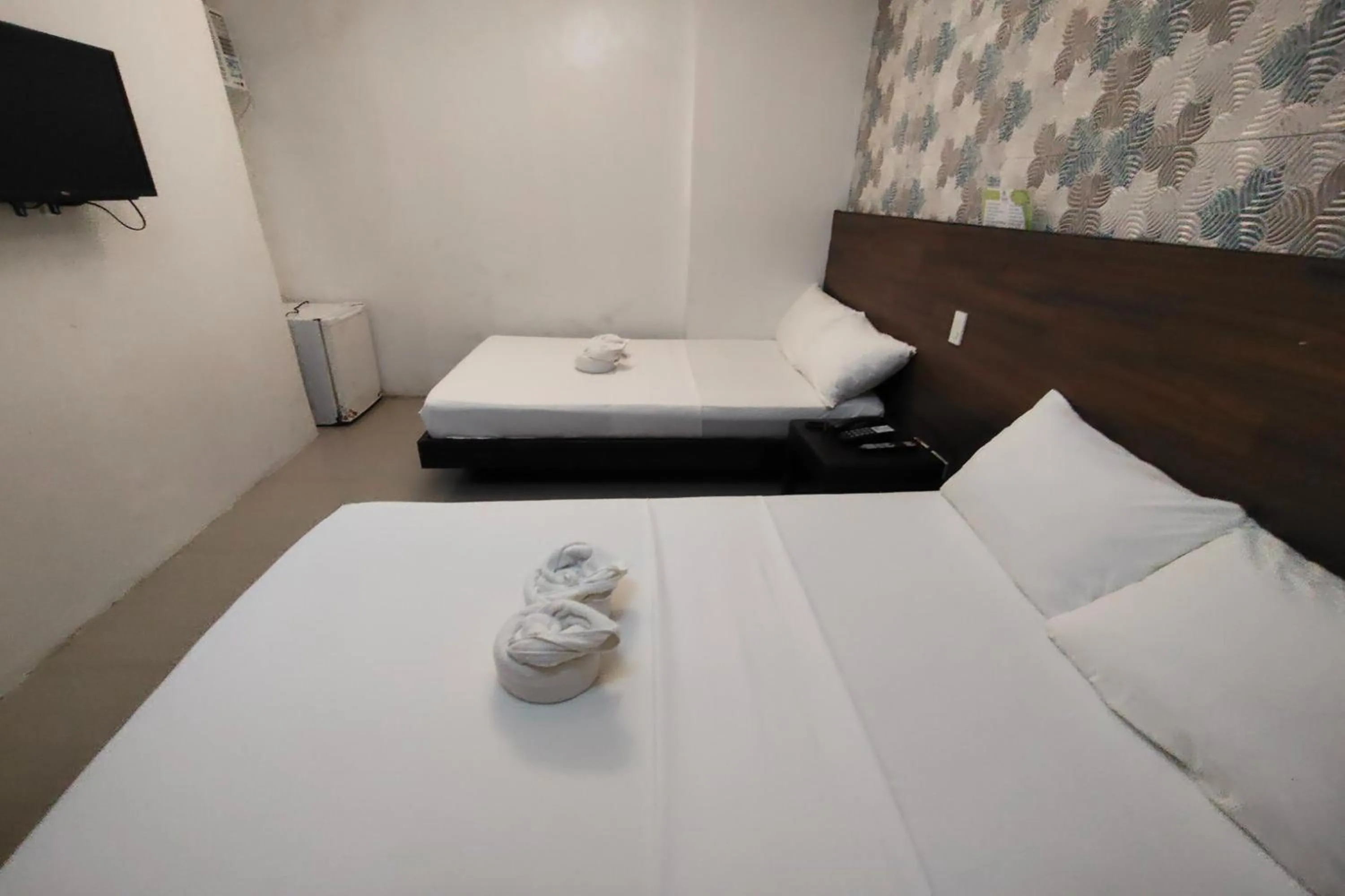 Bed in Taj Guesthouse Boracay