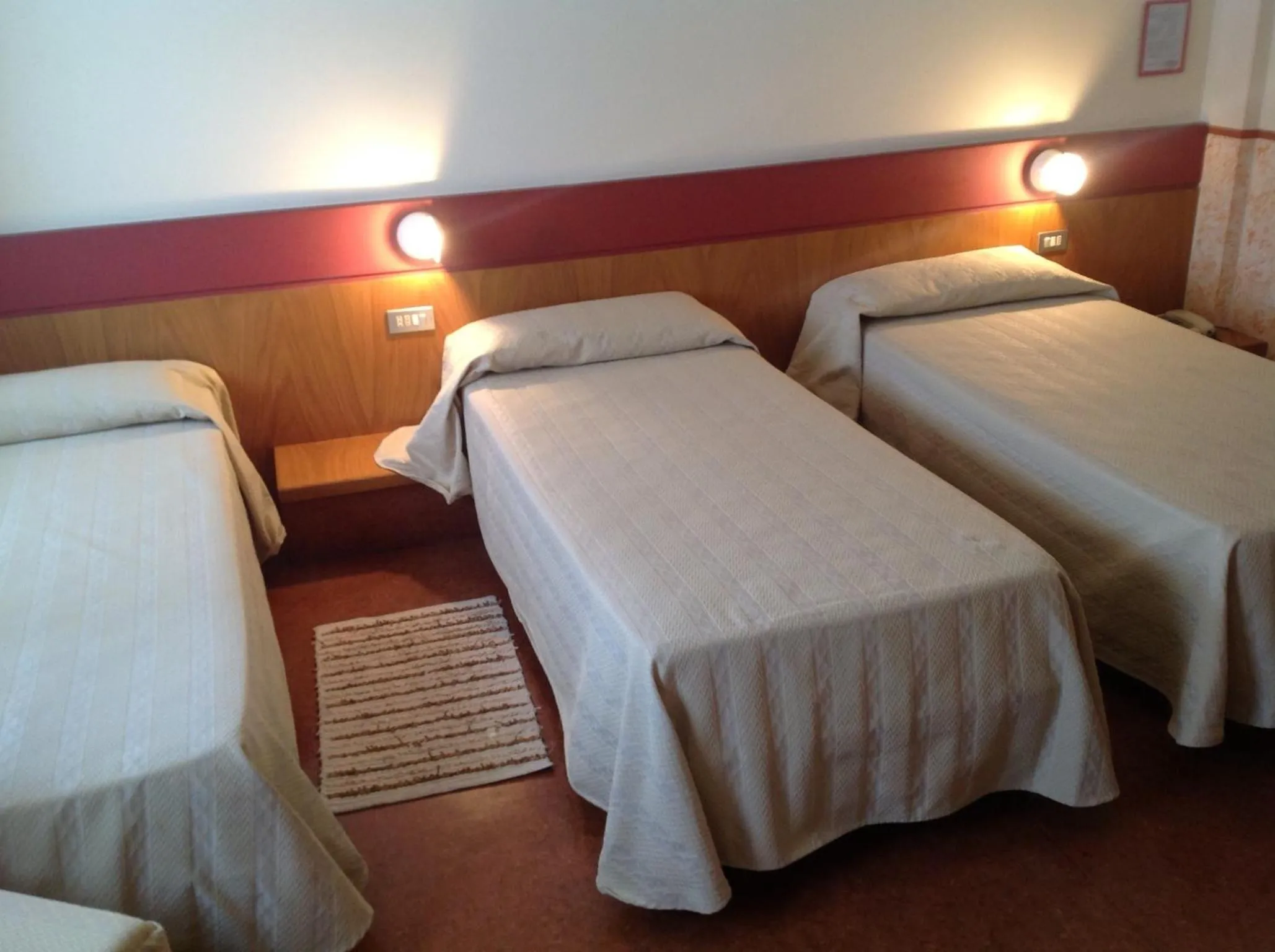 Bed in Hotel Roma