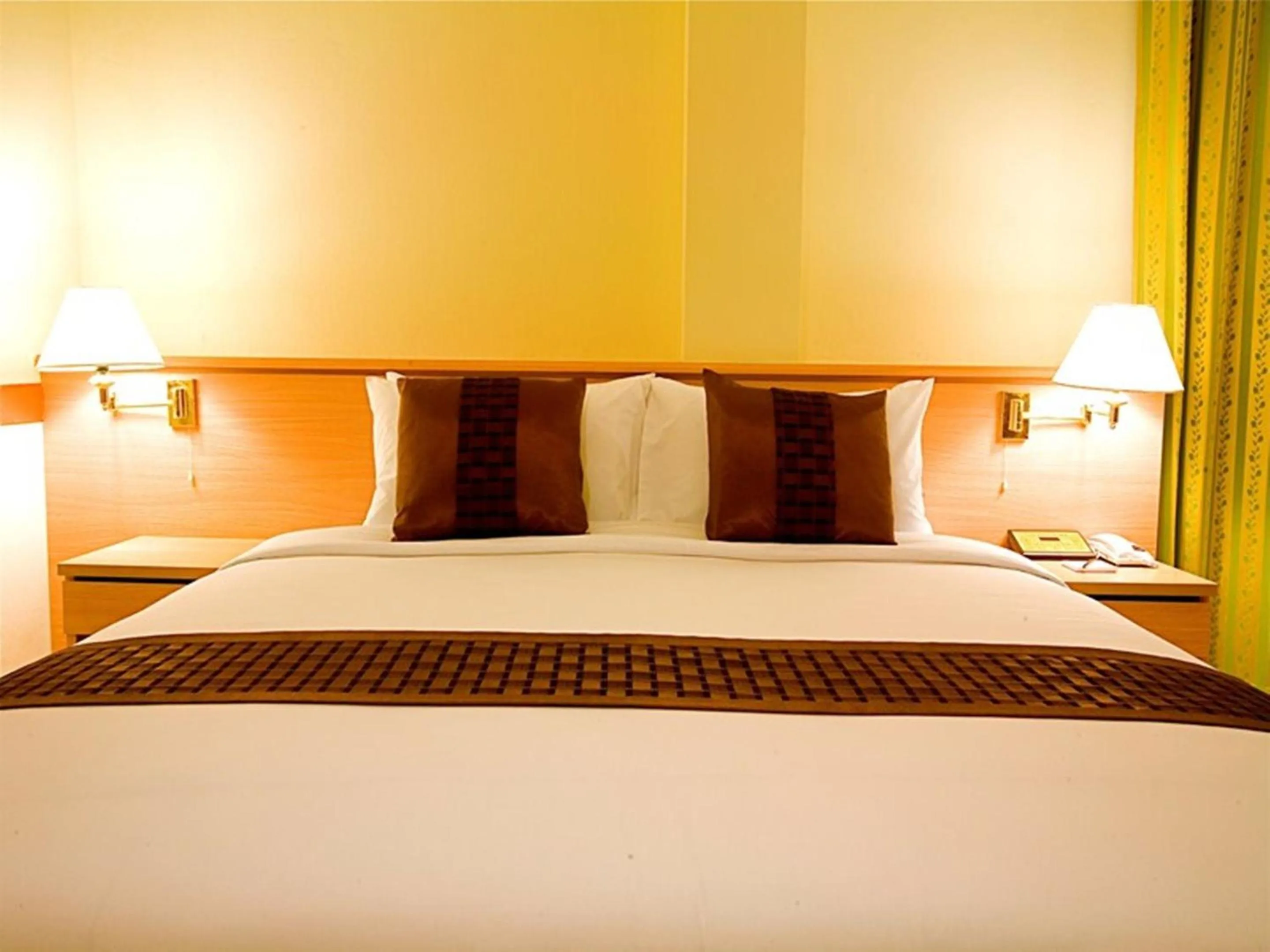 Bed in The Ecotel Bangkok