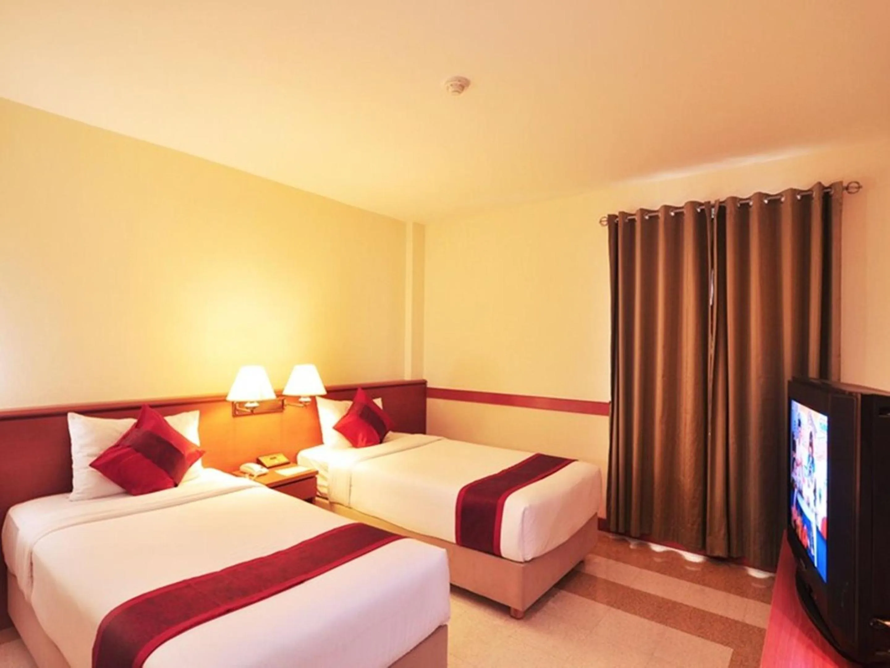 Bed in The Ecotel Bangkok