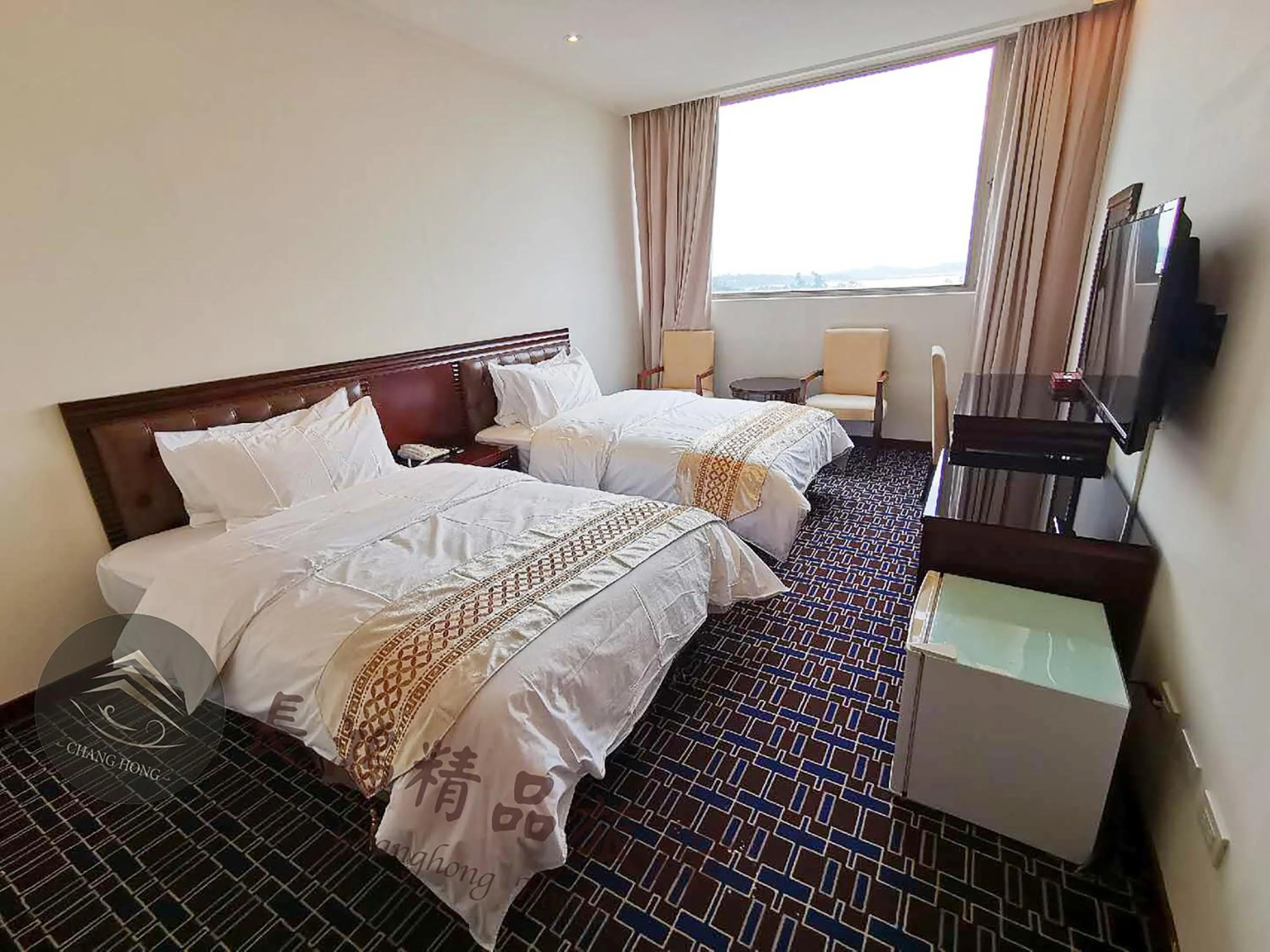 Bed in Chang Hong Hotel