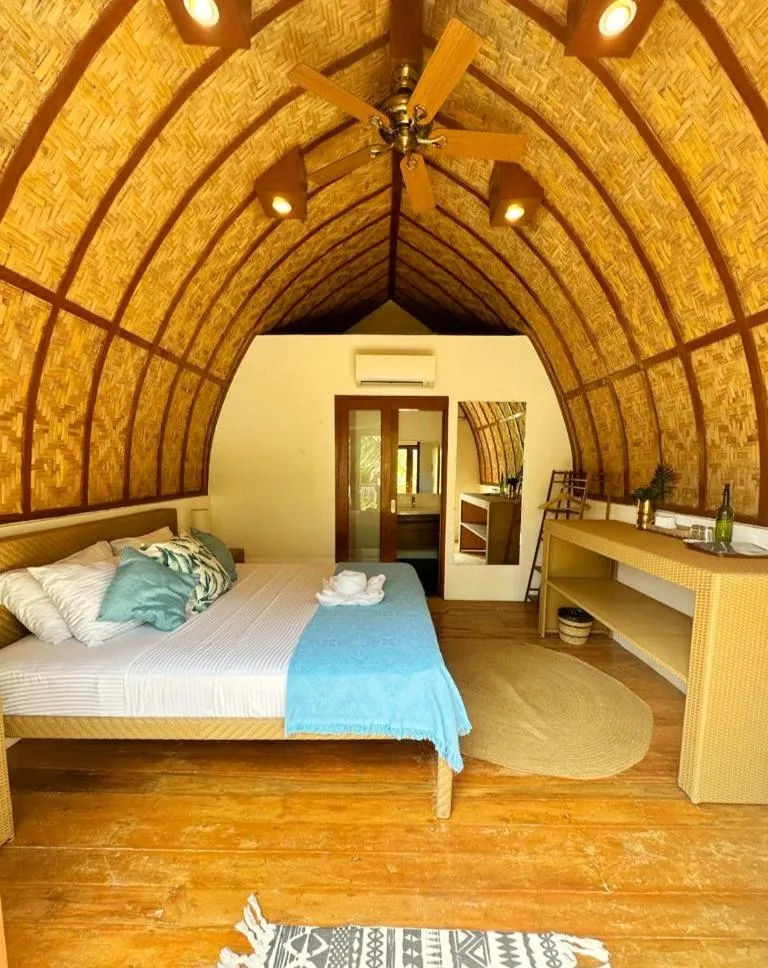 Bed in Tropical Temple Siargao Resort