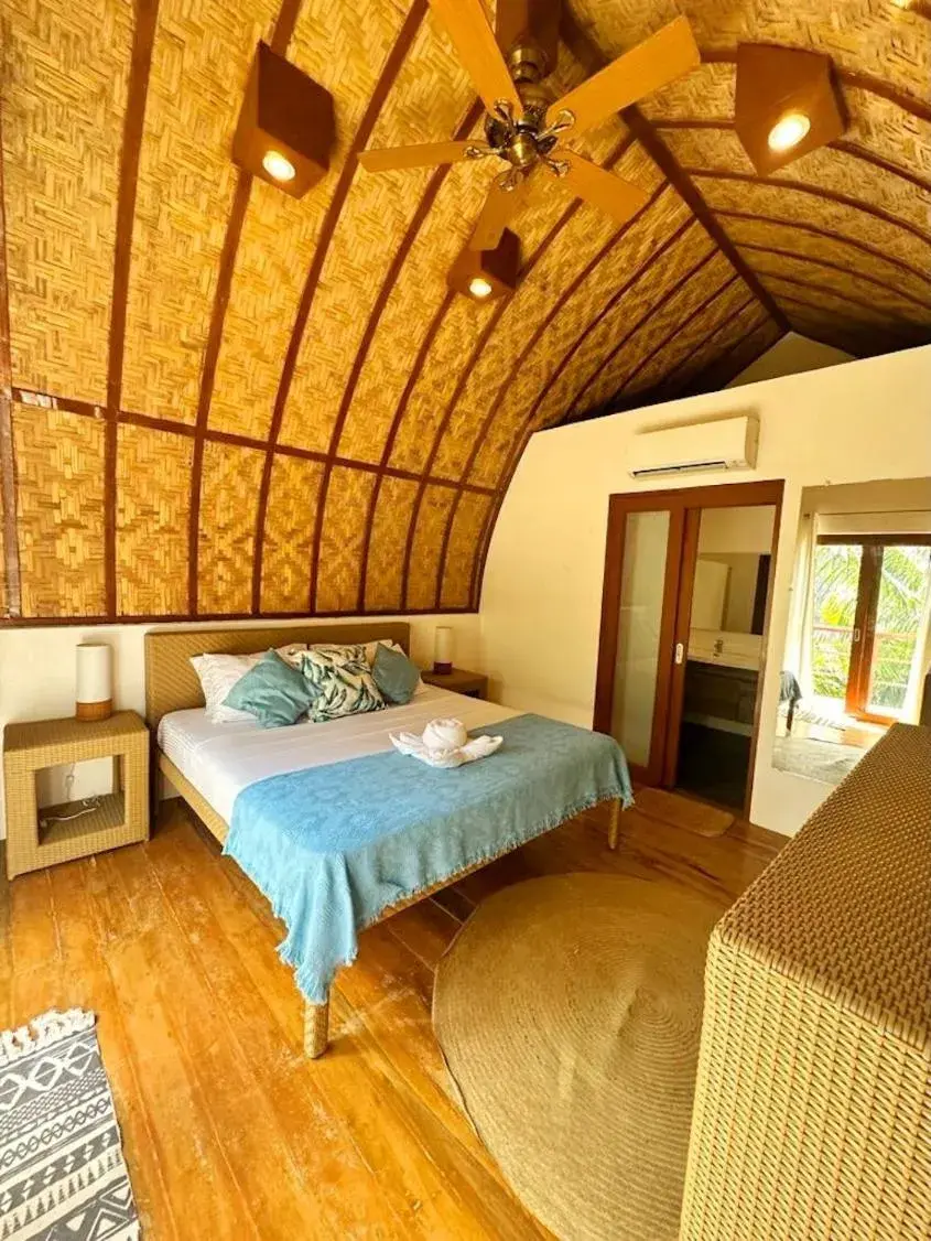 Bed in Tropical Temple Siargao Resort Bed in Tropical Temple Siargao Resort