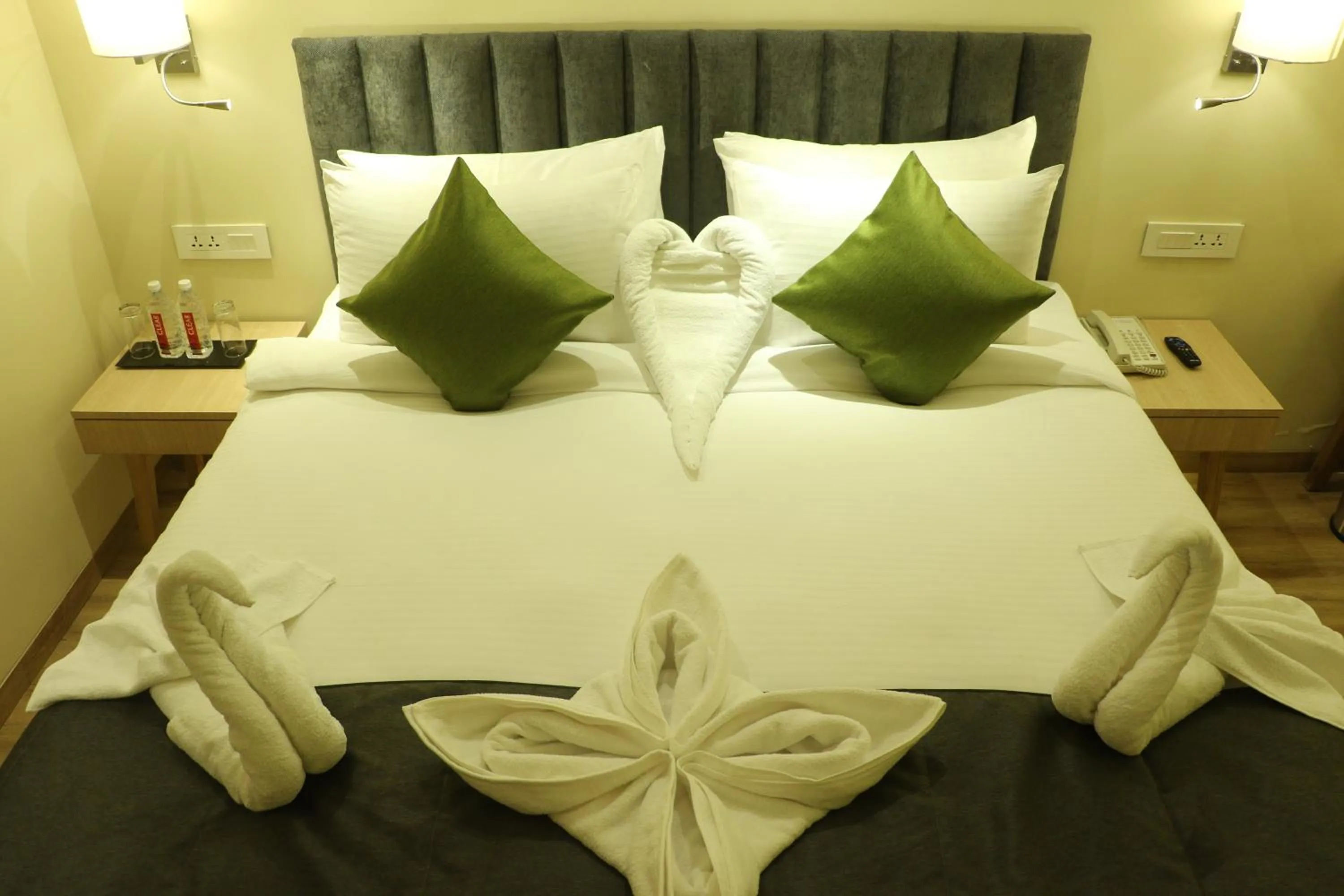 Bed in Regenta Central Harsha Vapi