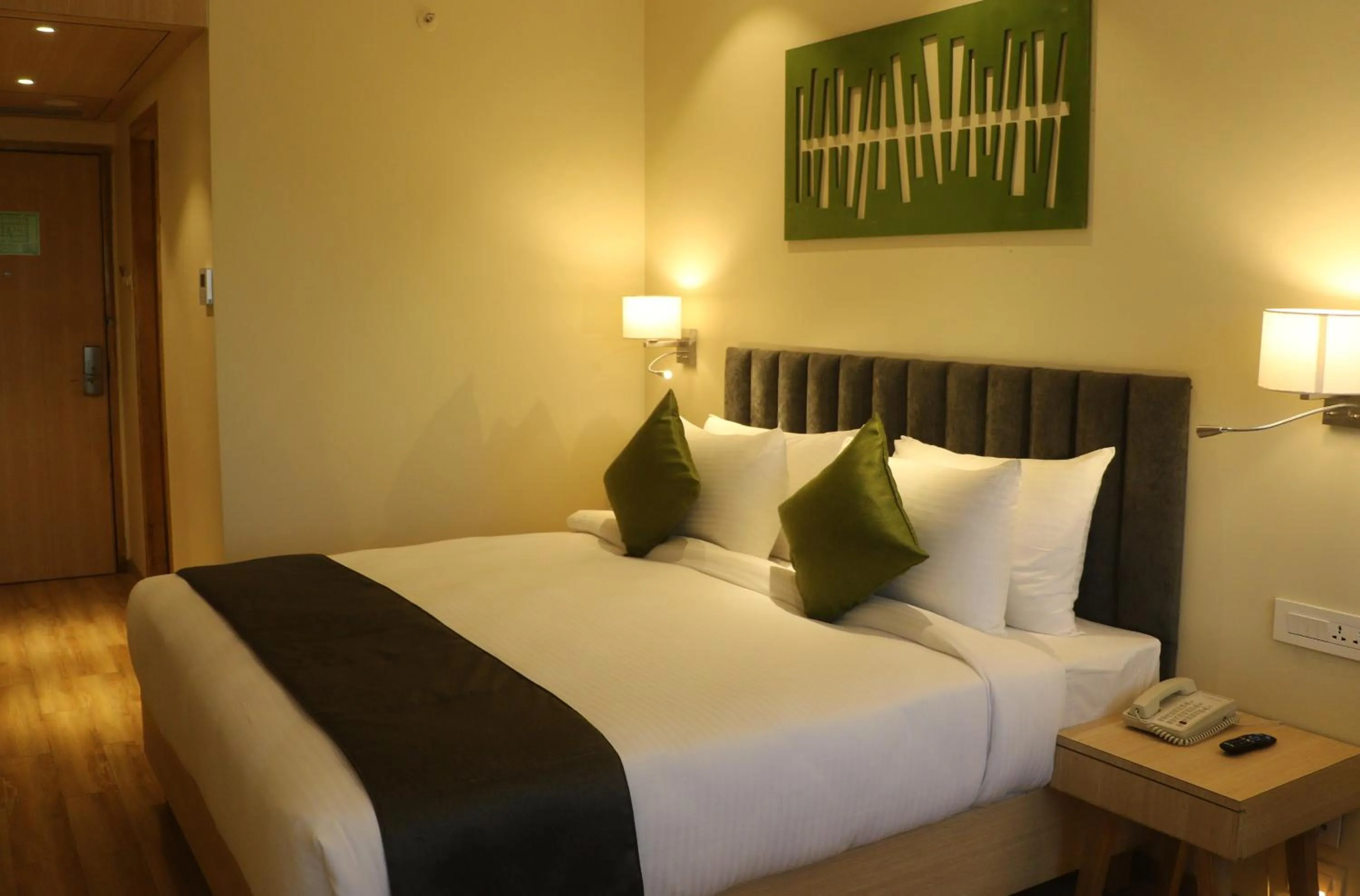 Bed in Regenta Central Harsha Vapi