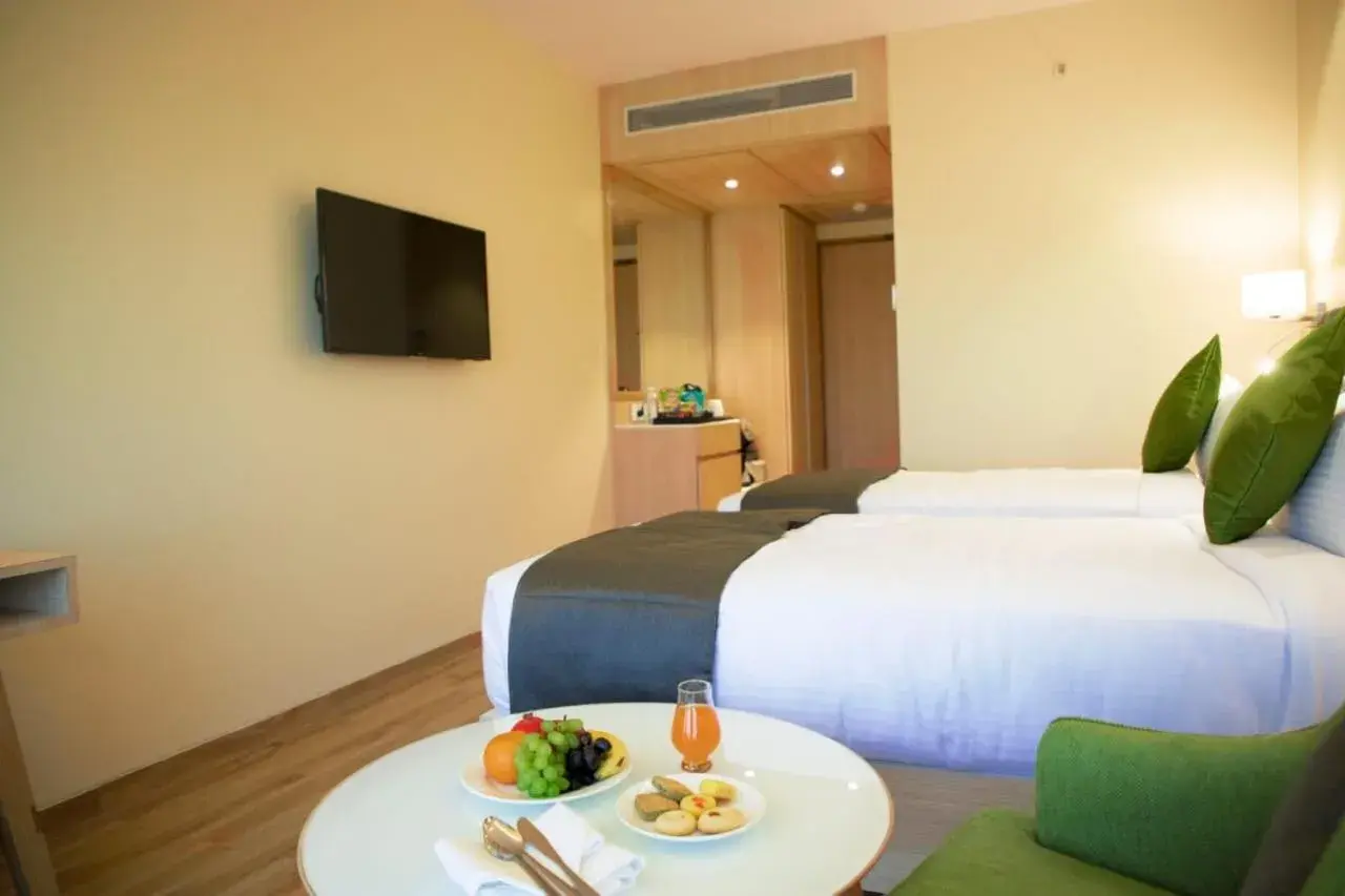 Photo of the whole room, Bed in Regenta Central Harsha Vapi Photo of the whole room, Bed in Regenta Central Harsha Vapi