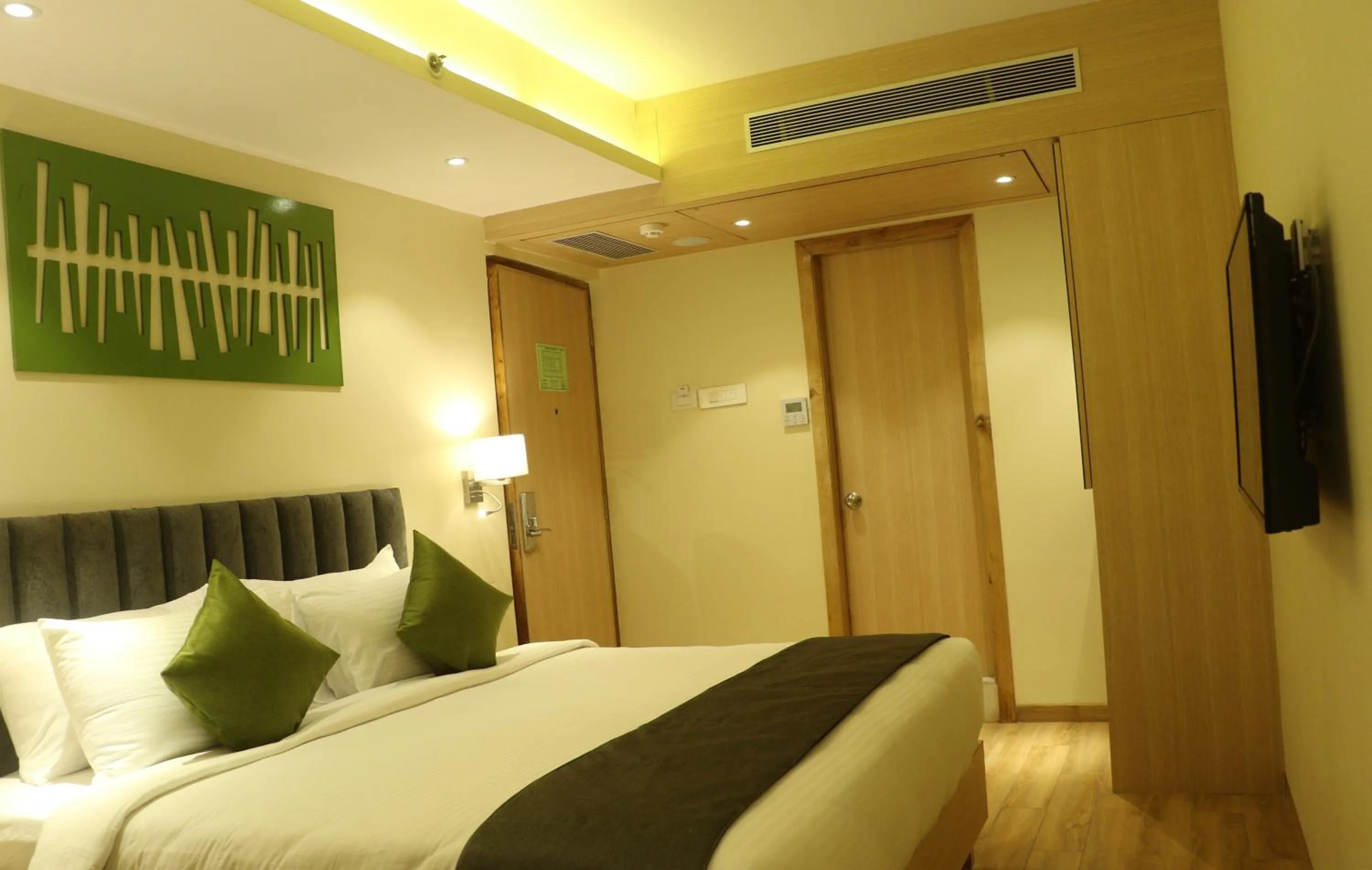 Bed in Regenta Central Harsha Vapi