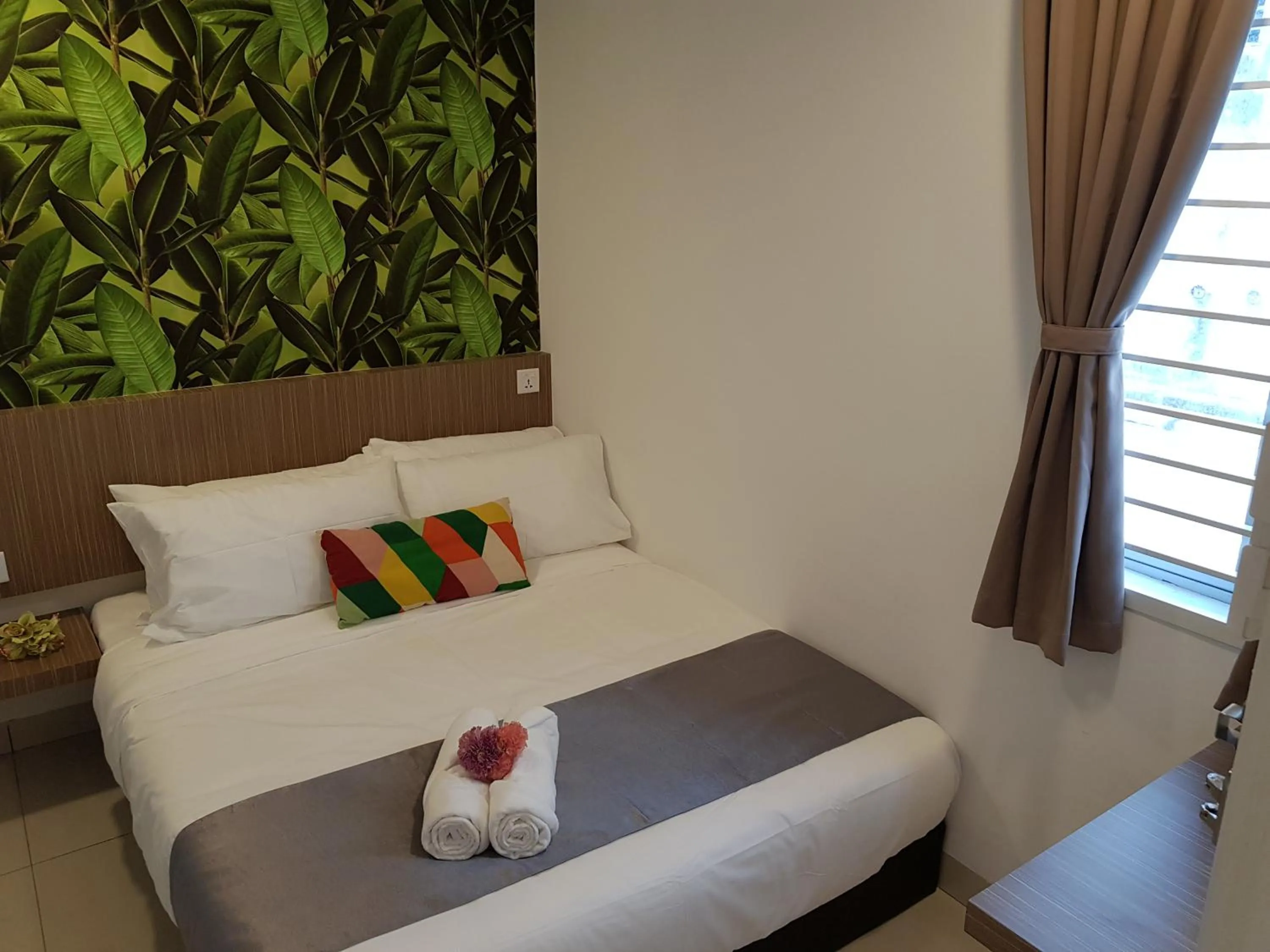 Bed in Teruntum 96 Guest house