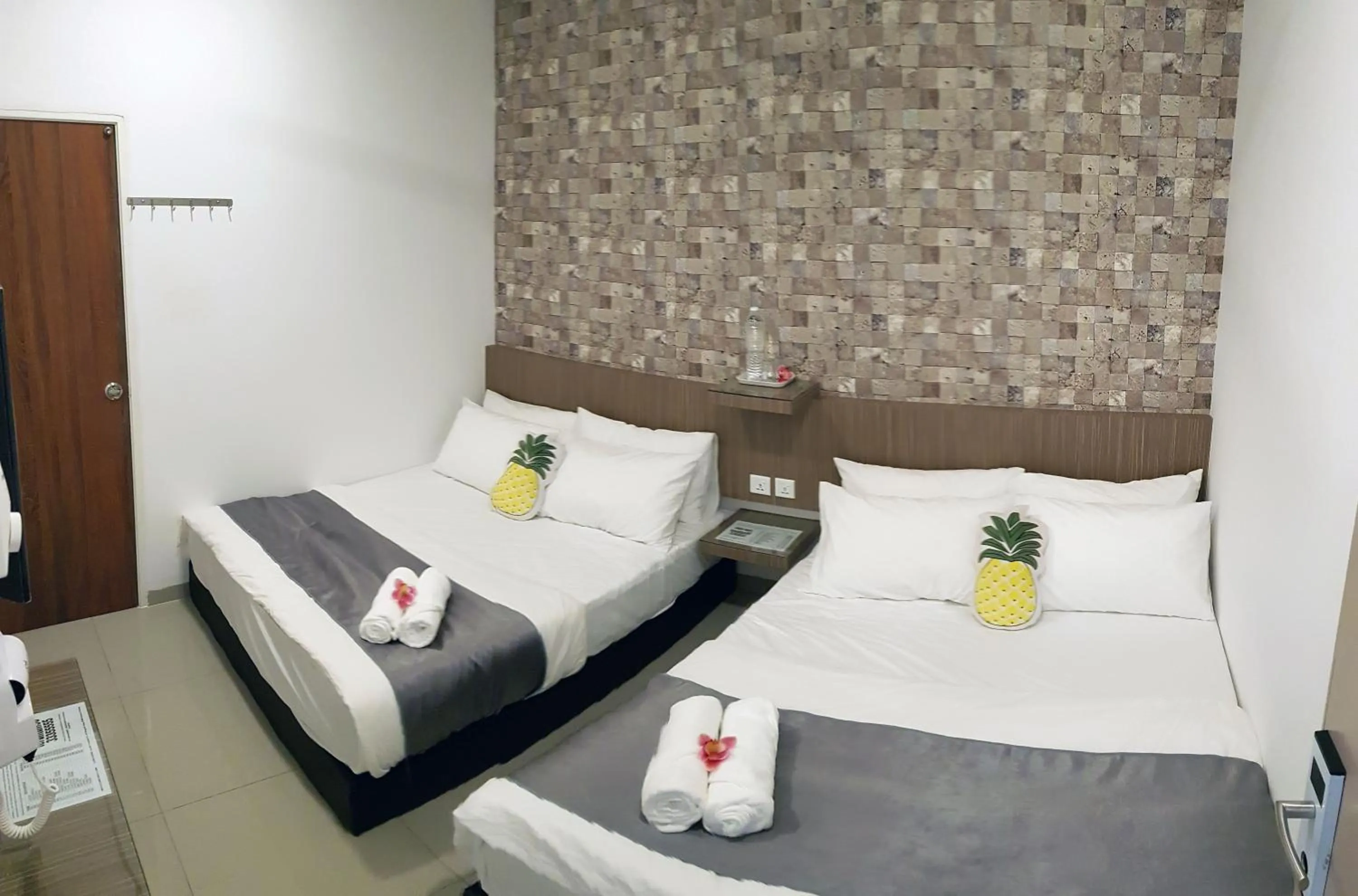 Bed in Teruntum 96 Guest house