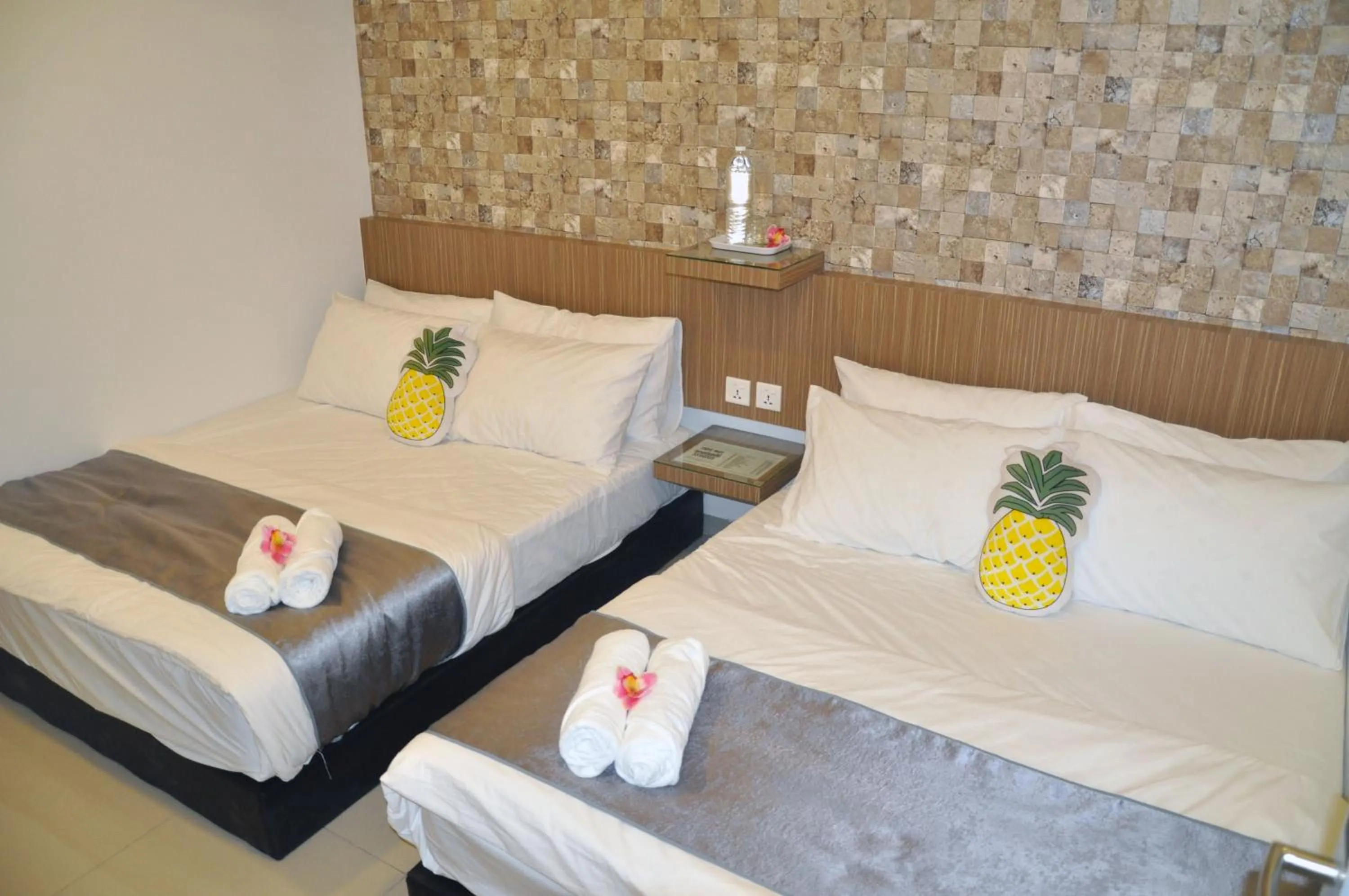 Bed in Teruntum 96 Guest house