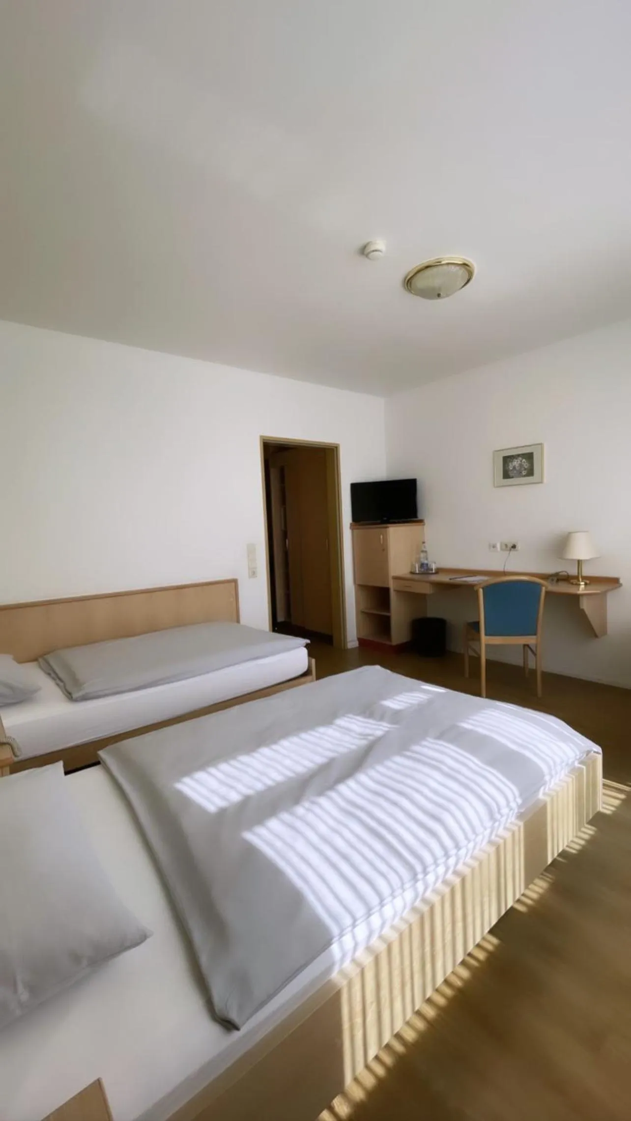 Bed in Hotel Rosenheim