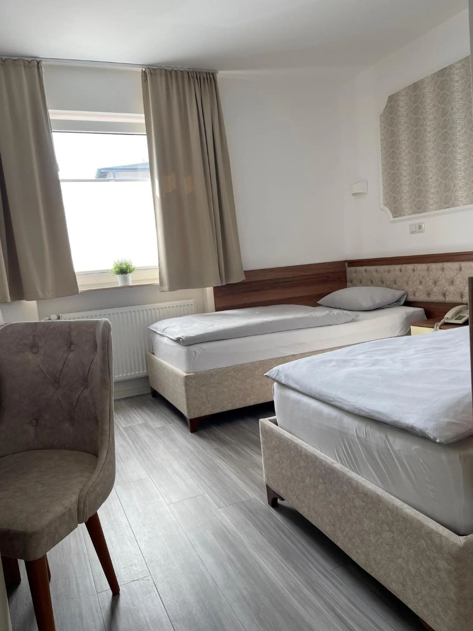 Bed in Hotel Rosenheim