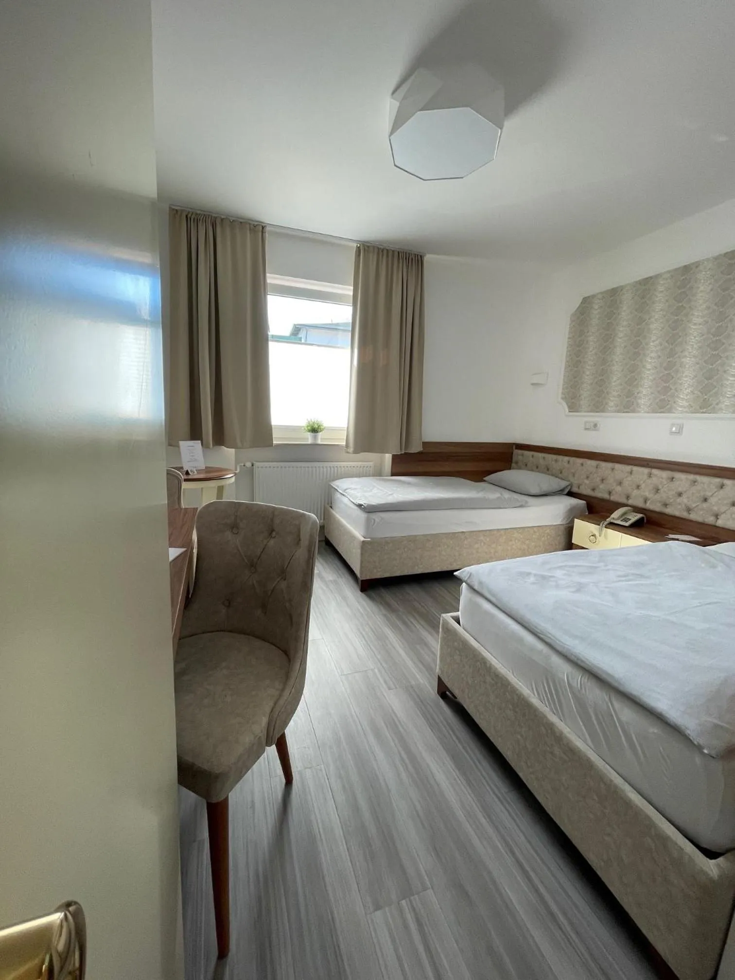 Bed in Hotel Rosenheim