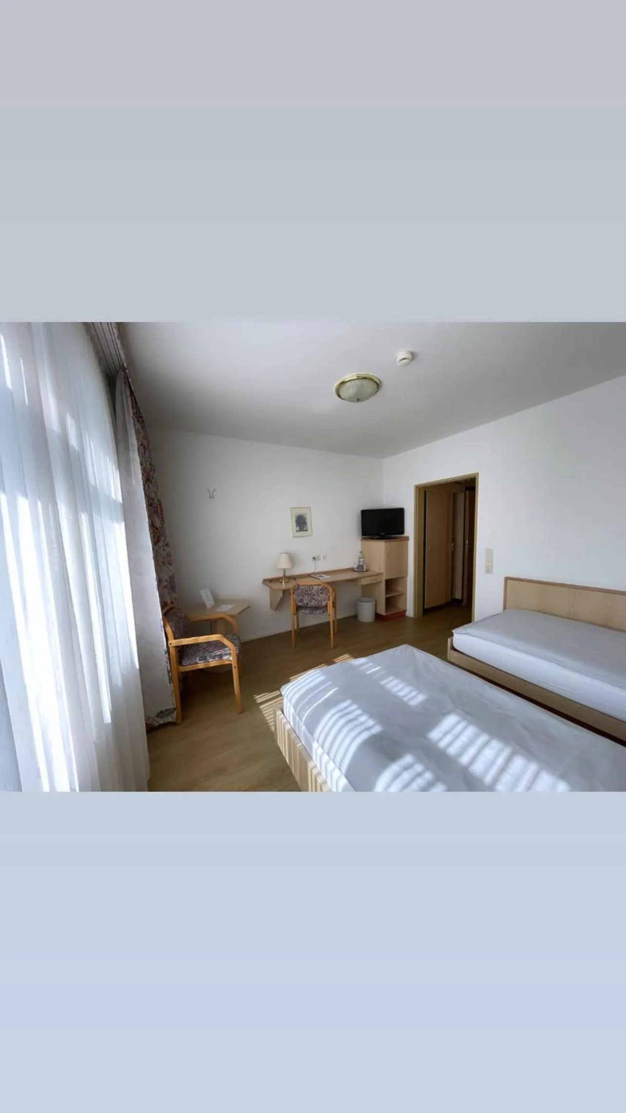 Bed in Hotel Rosenheim