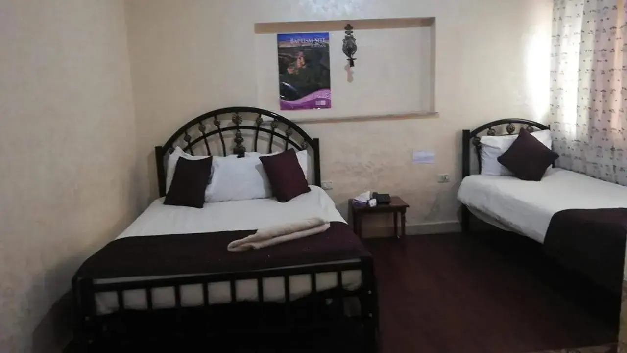 Bedroom in Caravan Hotel