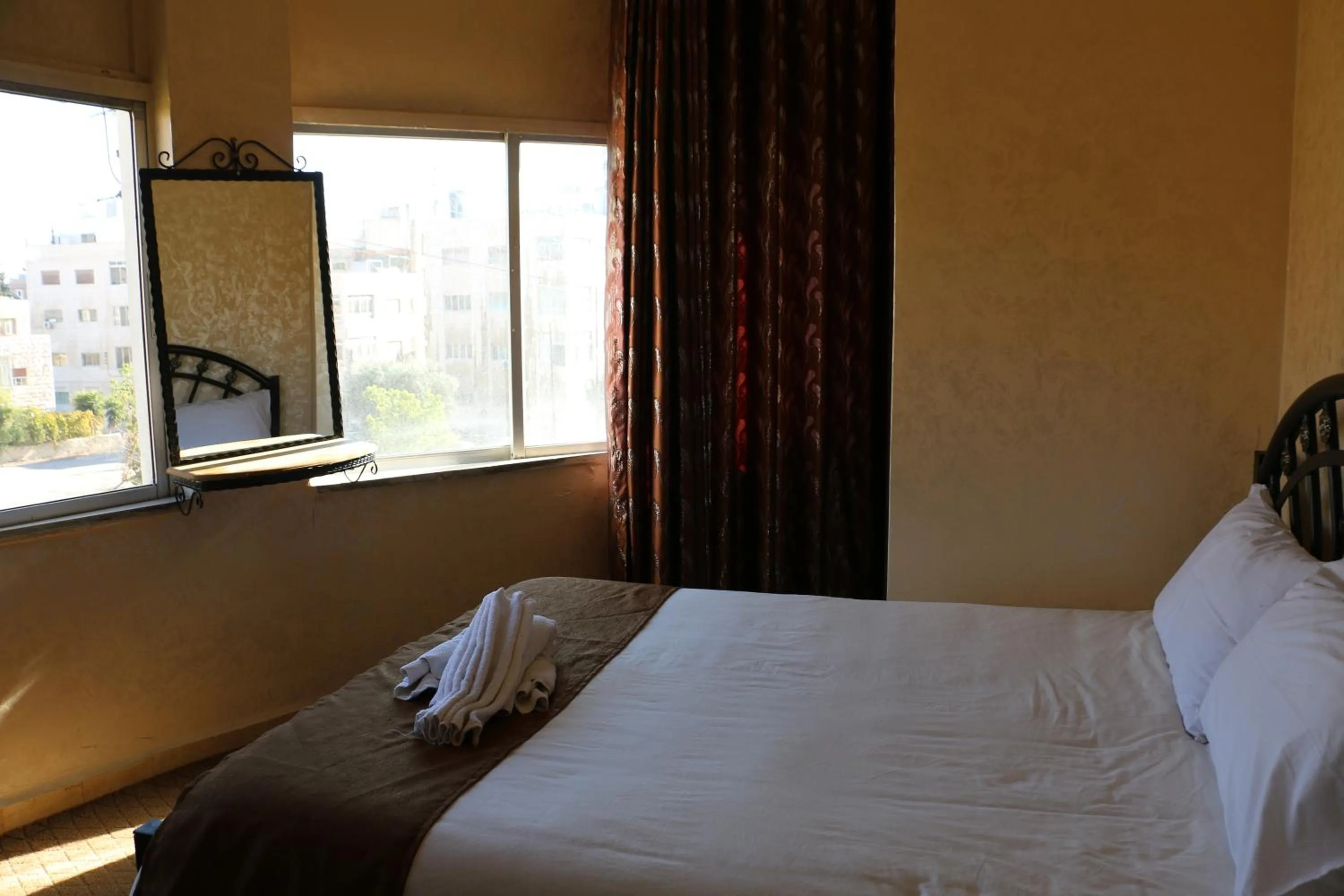 Bedroom in Caravan Hotel