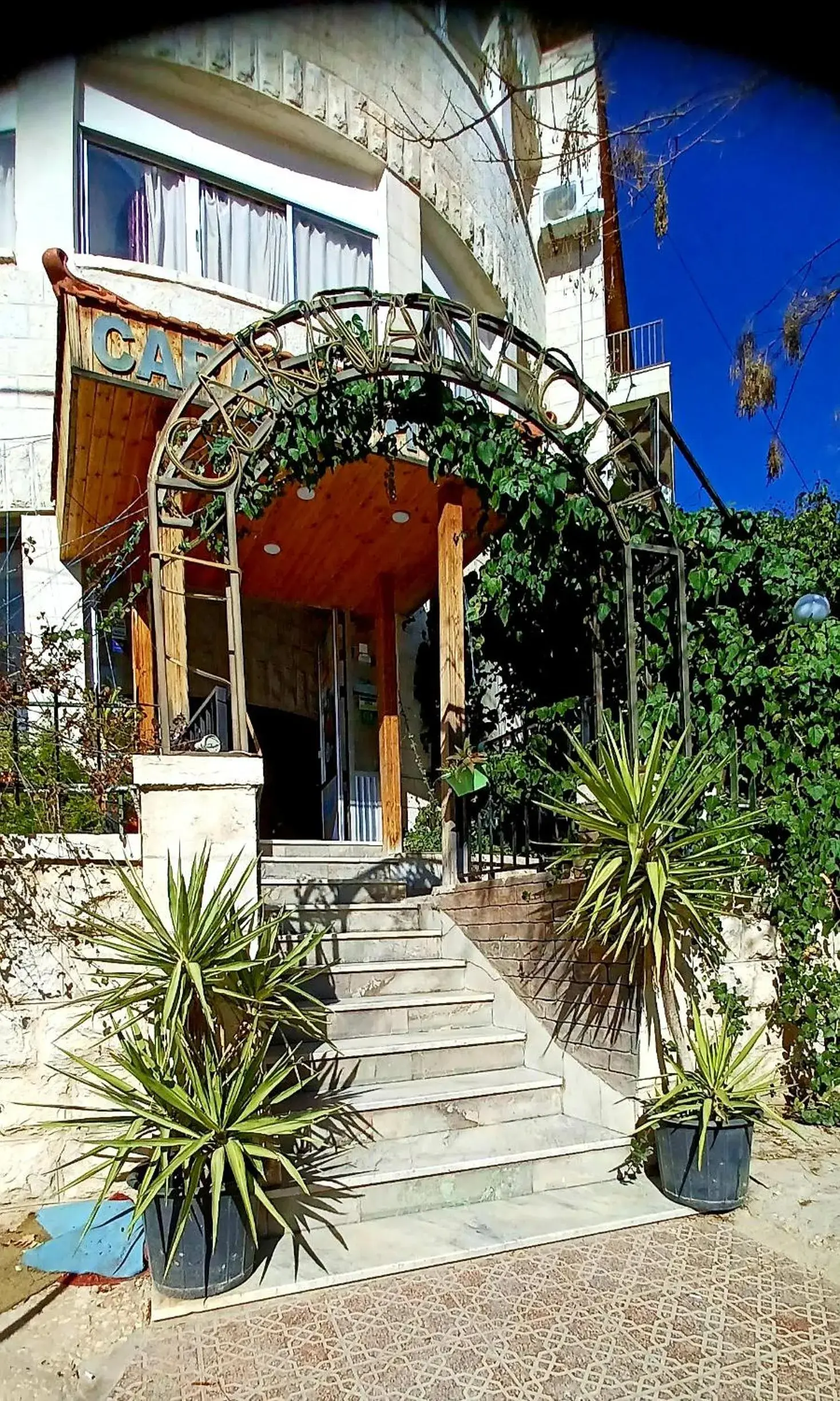 Facade/entrance in Caravan Hotel