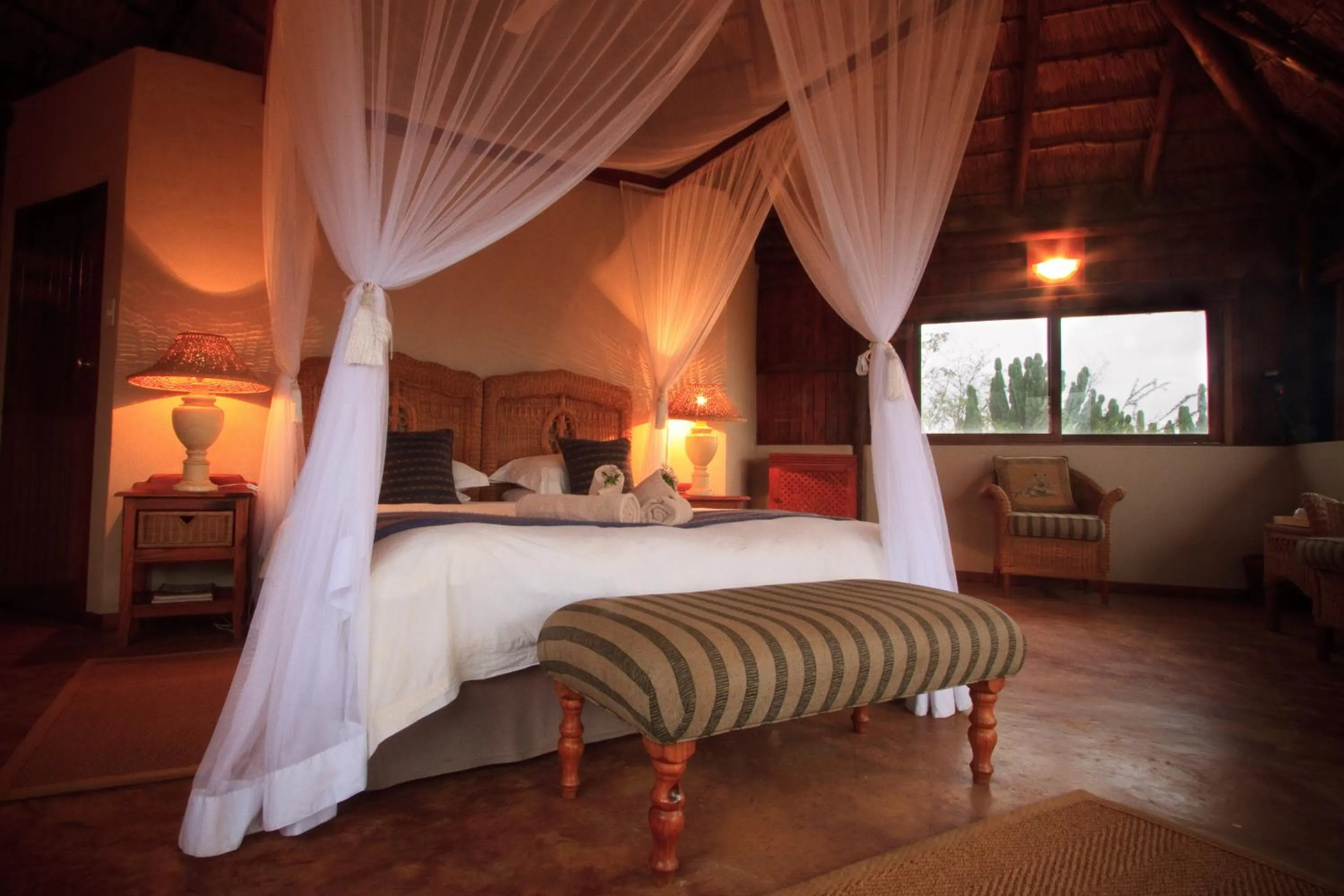 Bed in Shayamoya Tiger Fishing and Game Lodge