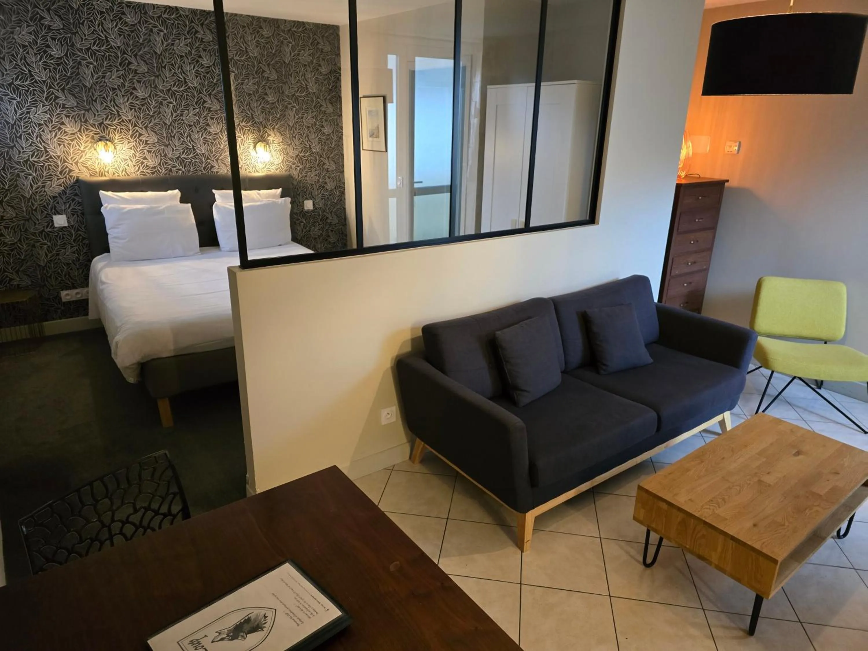 Living room, Bed in Au Loup Historic Apartments