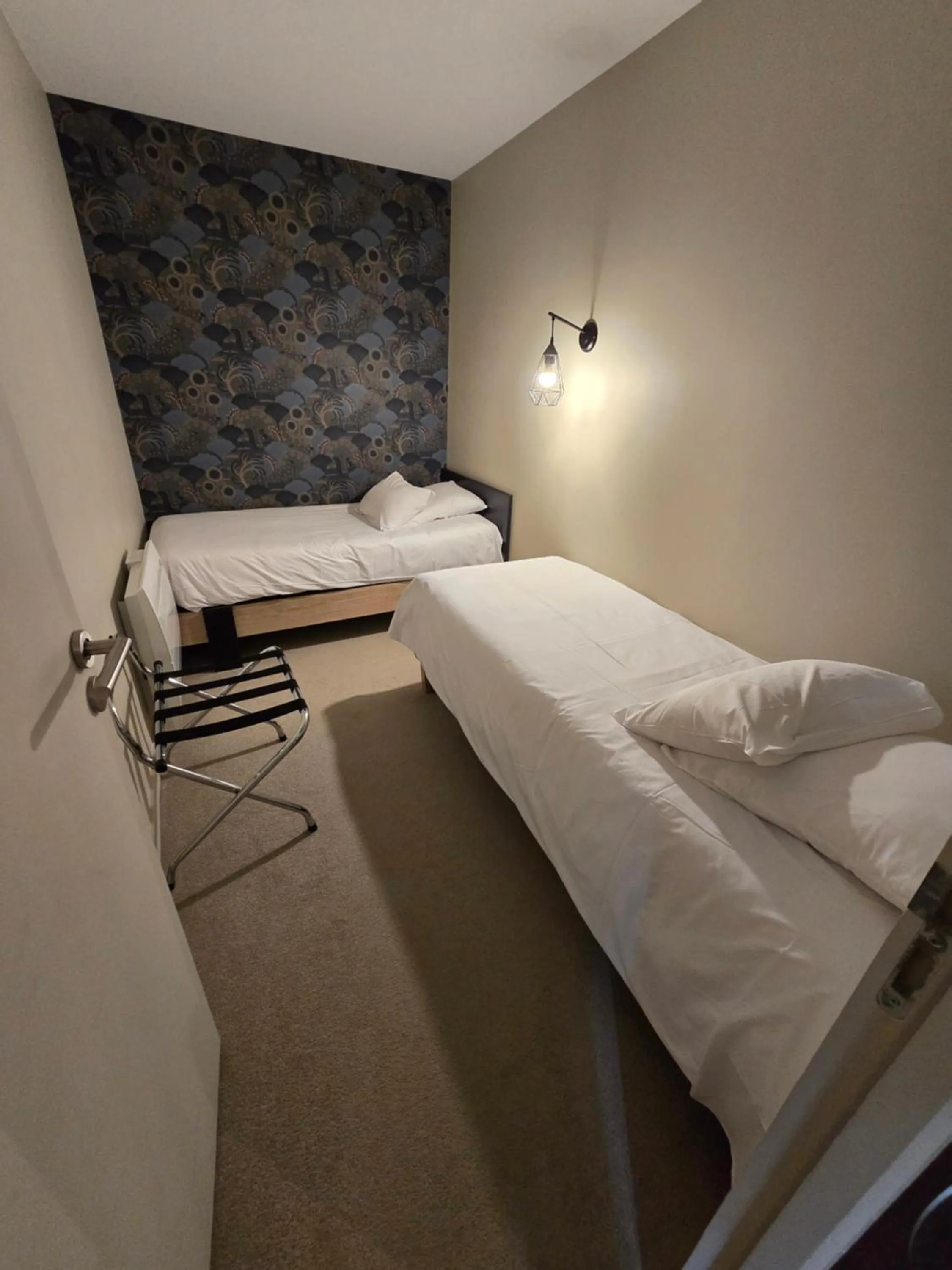 Bed in Au Loup Historic Apartments